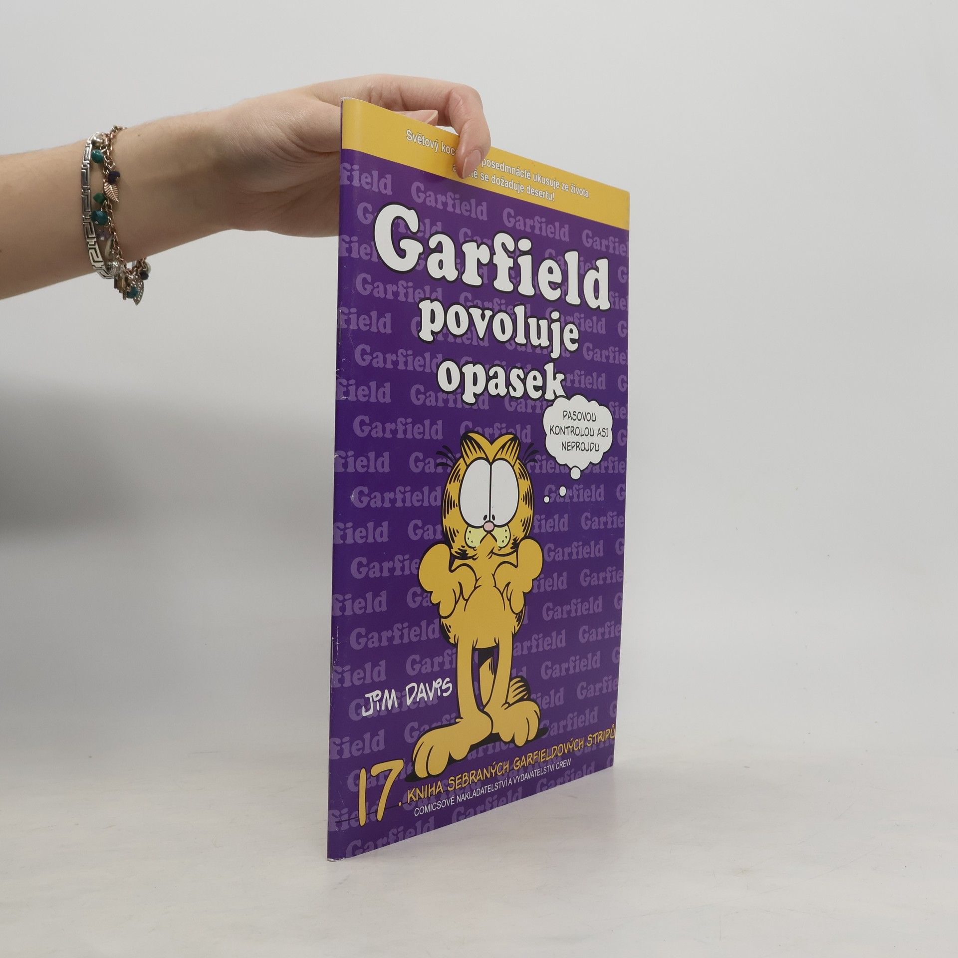 Jim Davis Garfield povoluje opasek