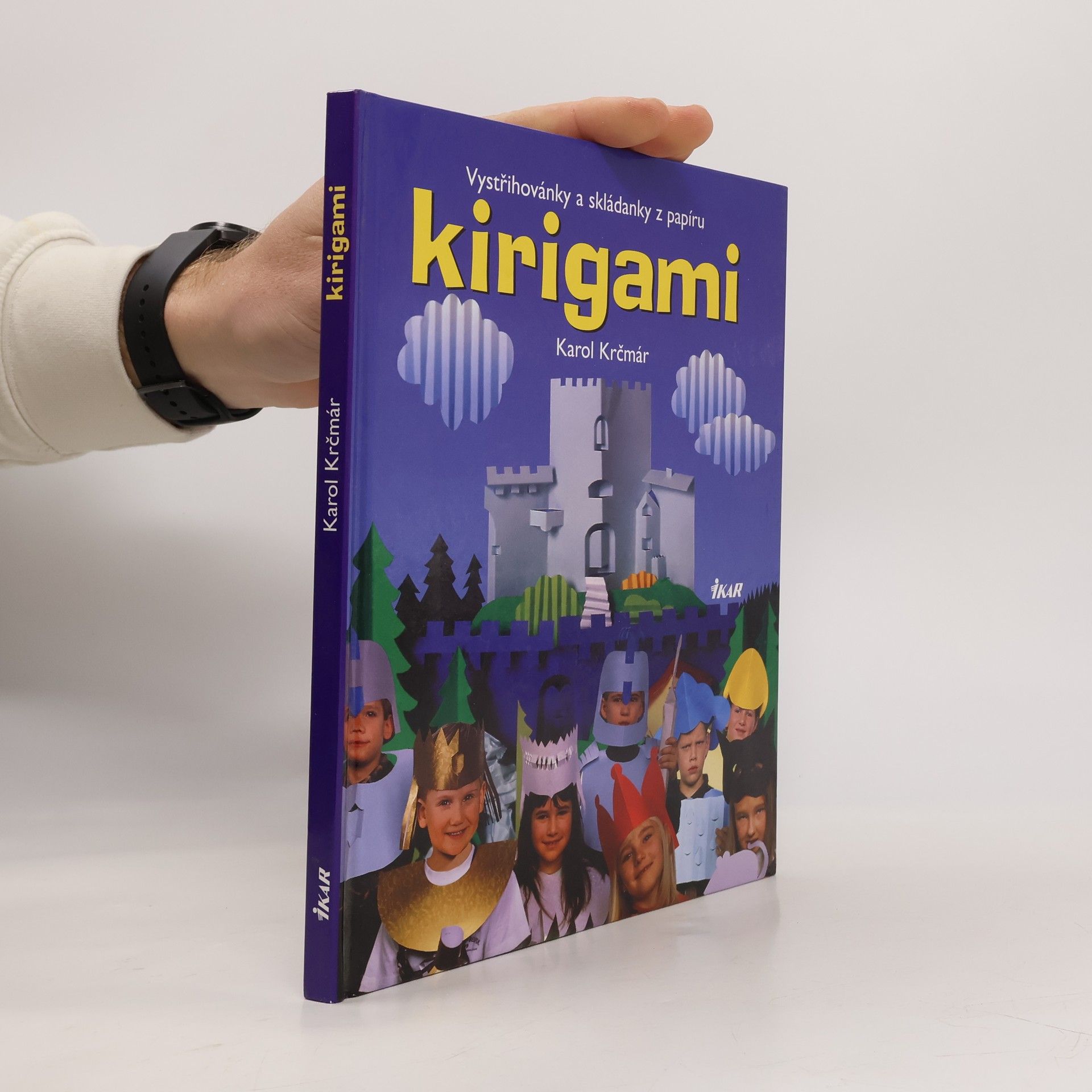 Karol Krčmár Kirigami. Vystřihovánky a skládanky - tvarování papíru stříháním a překládáním s návody, kresbami a fotografiemi