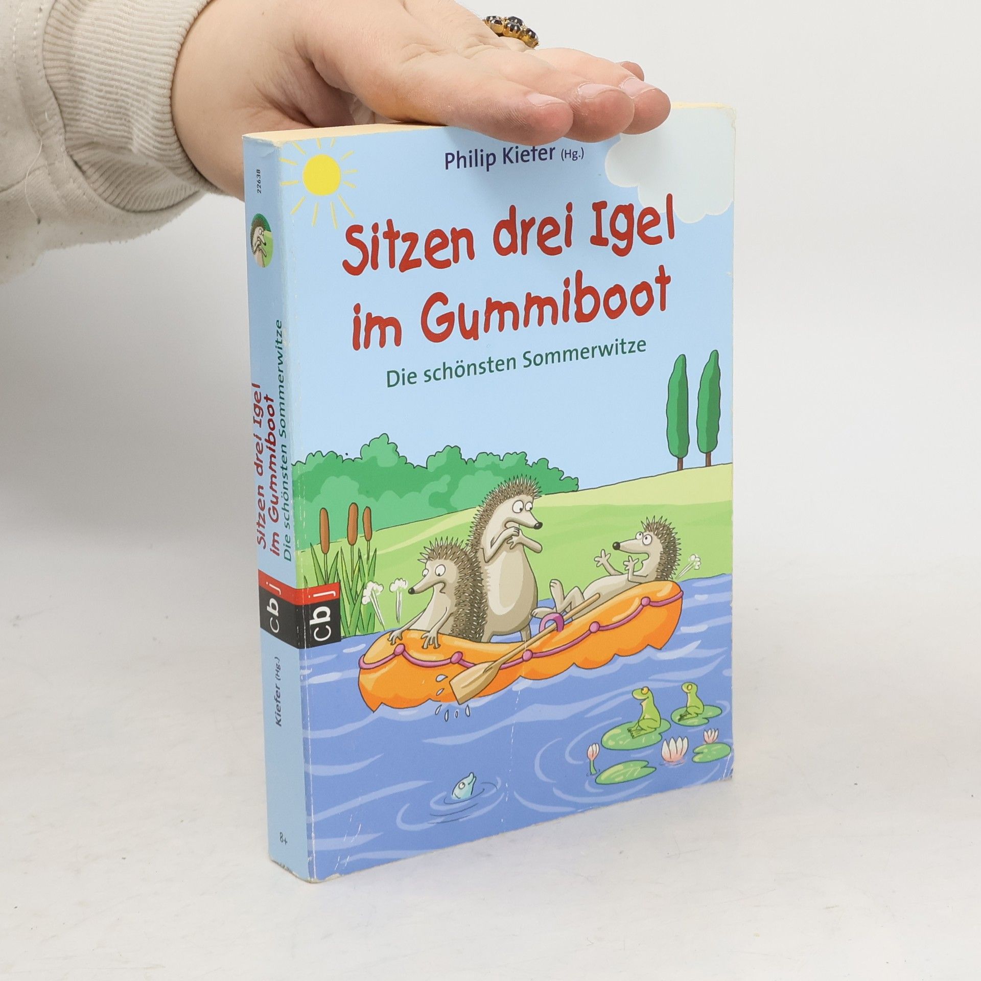 Philip Kiefer Sitzen drei Igel im Gummiboot