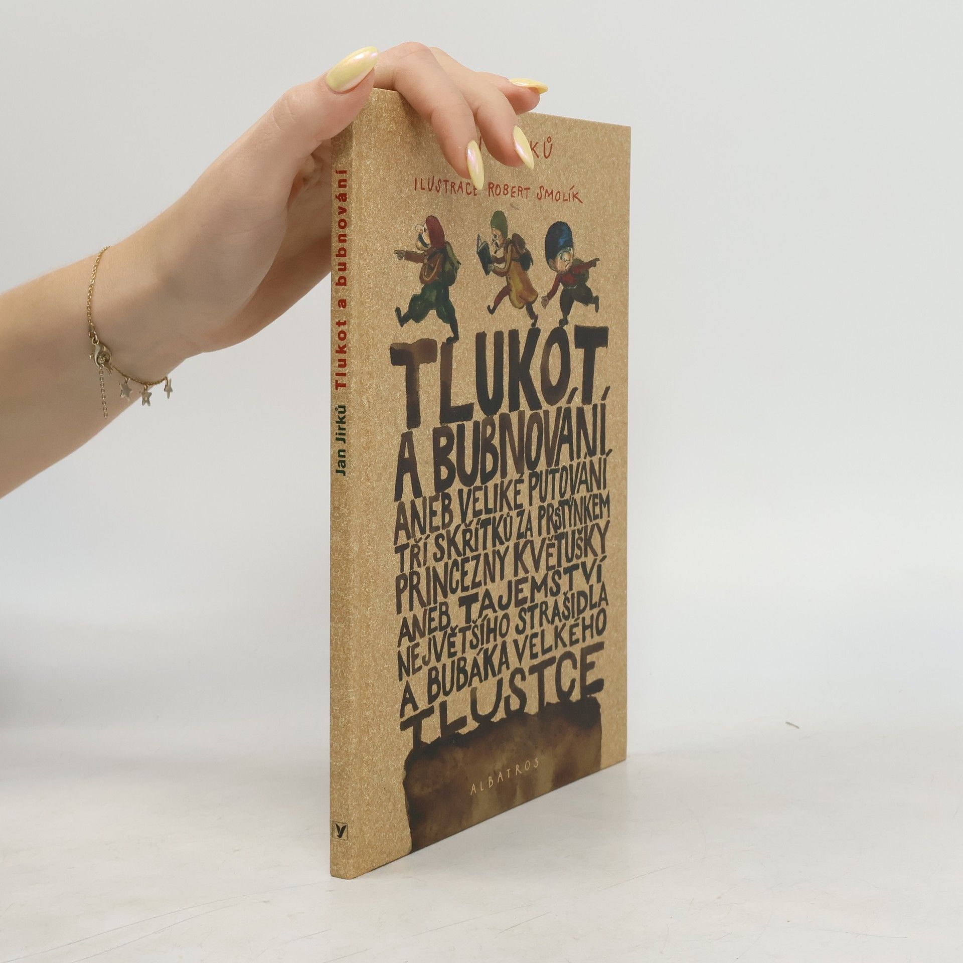 Jan Jirků Tlukot a bubnování, aneb, Veliké putování tří skřítků za prstýnkem princezny Květušky, aneb, Tajemství největšího strašidla a bubáka Velkého Tlustce