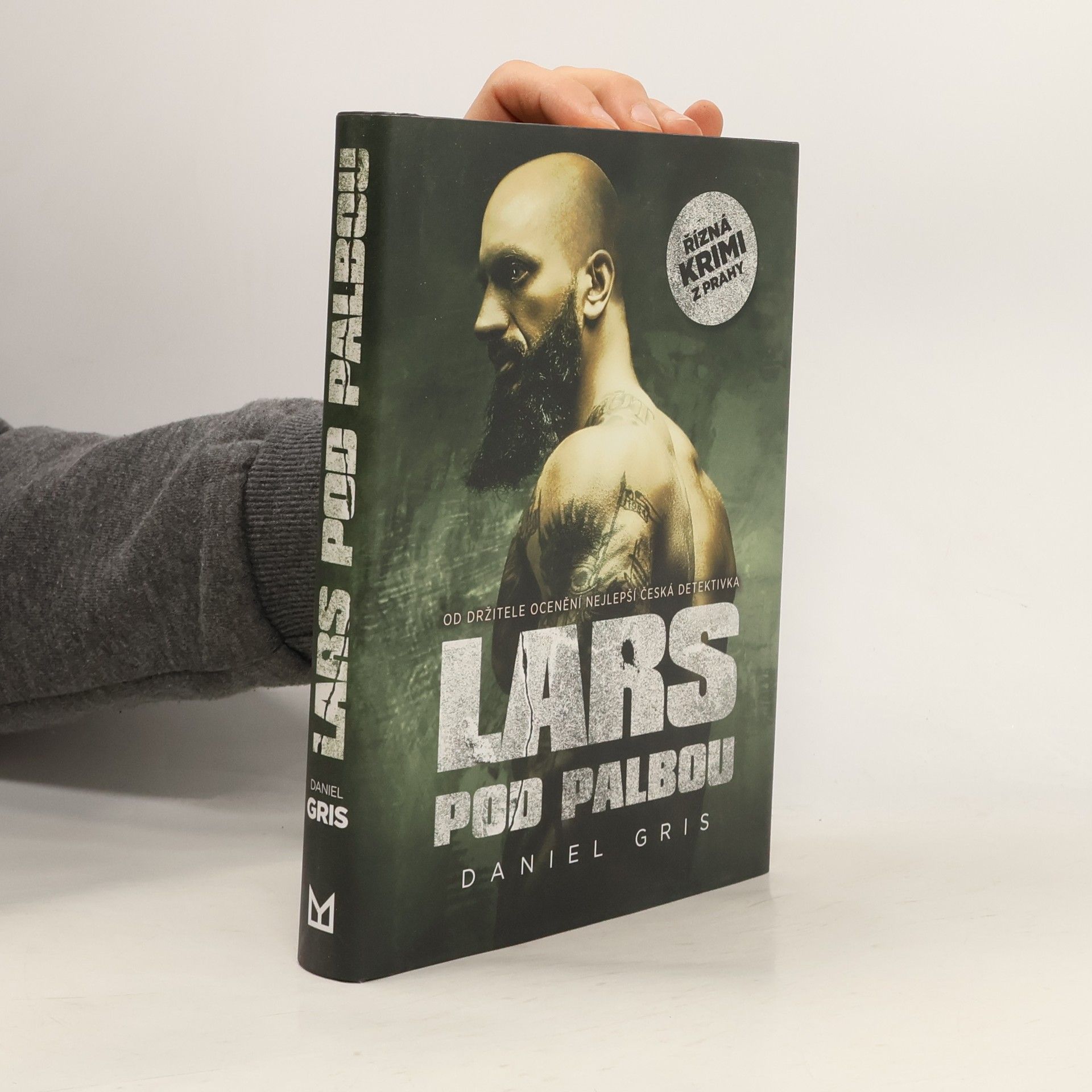 Daniel Gris Lars pod palbou