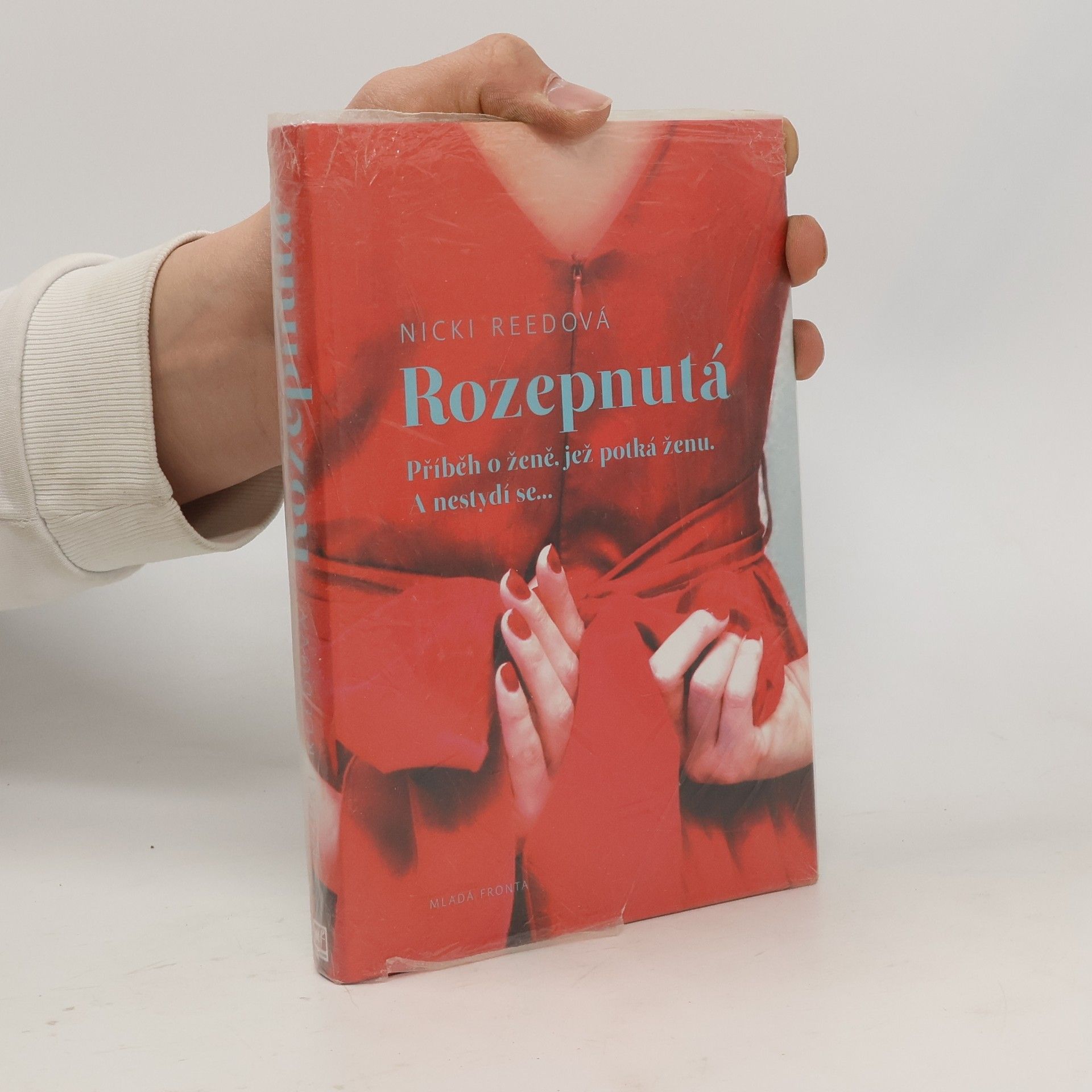 Nicole M. Reed Rozepnutá