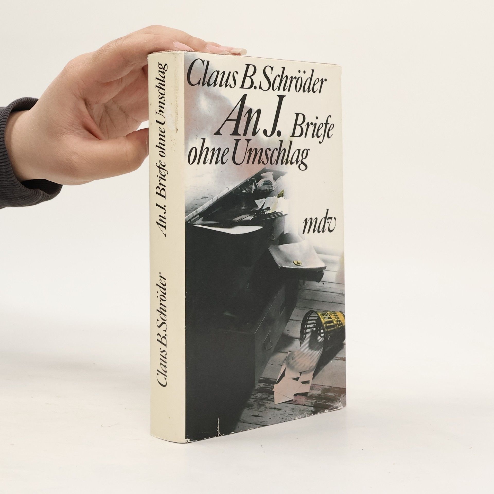 Claus B. Schröder An J.
