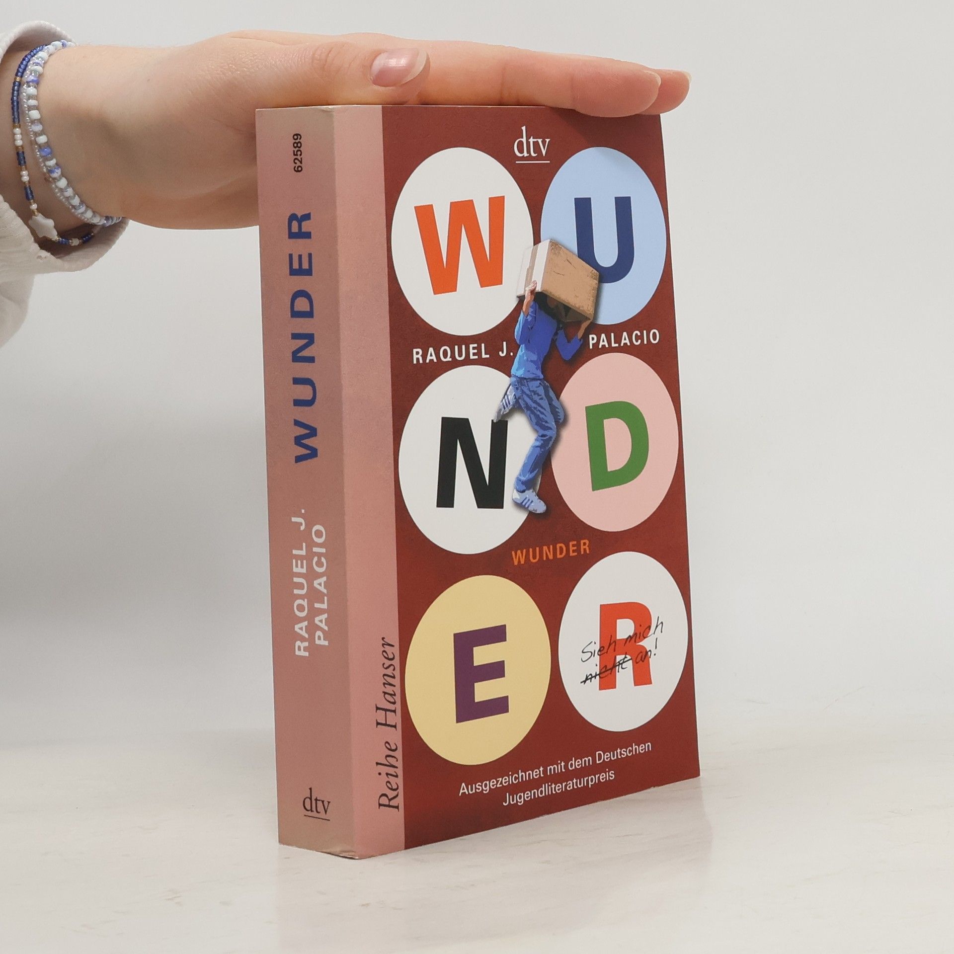 Raquel J. Palacio Wunder