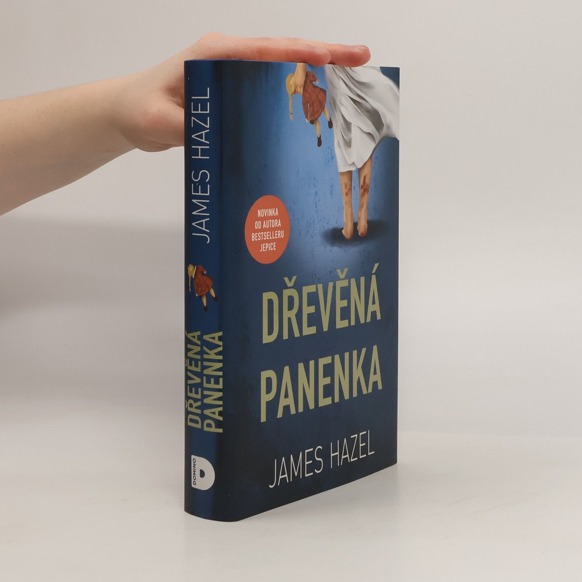 James Hazel Dřevěná panenka