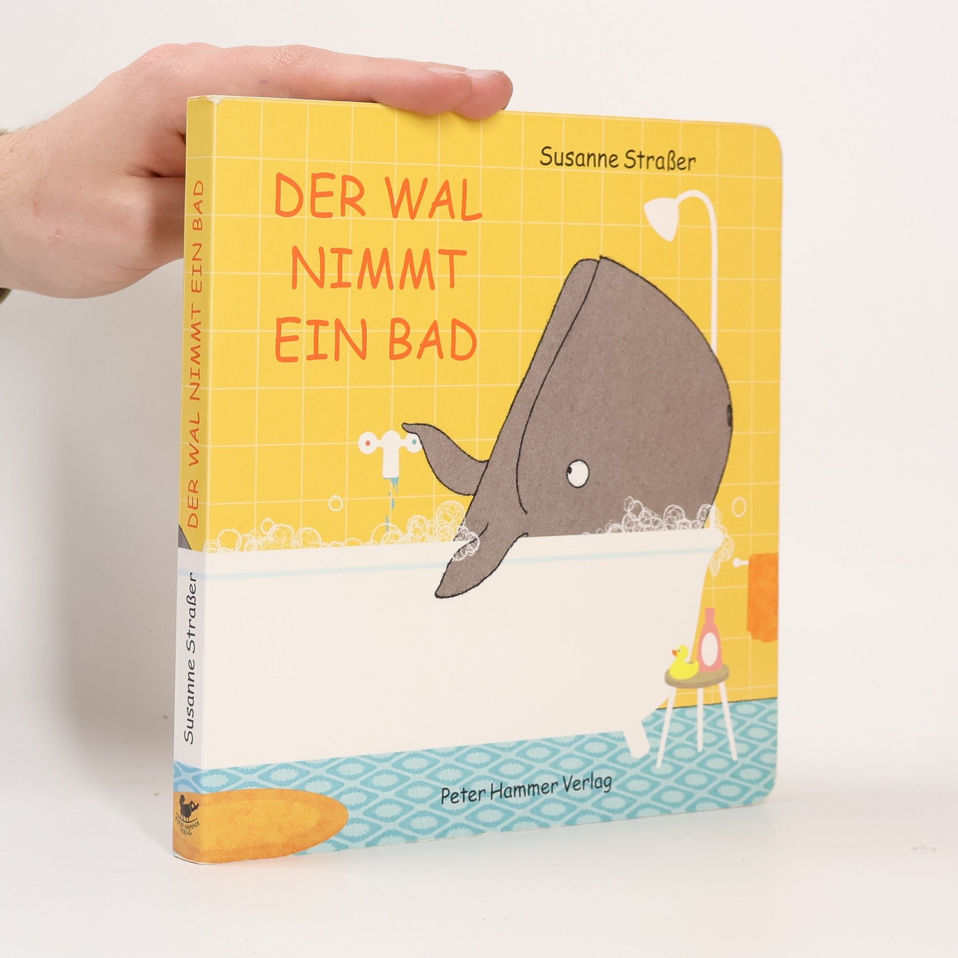 Der Wal nimmt ein Bad