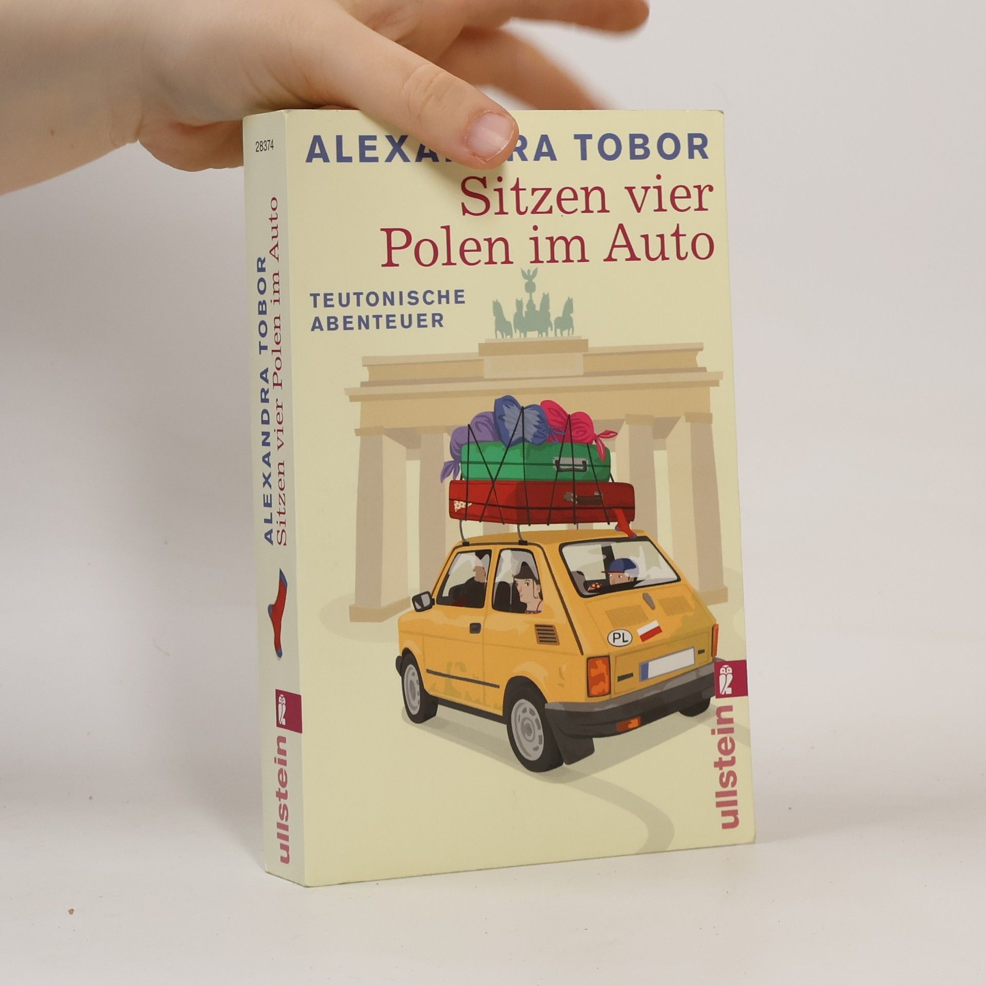 Alexandra Tobor Sitzen vier Polen im Auto