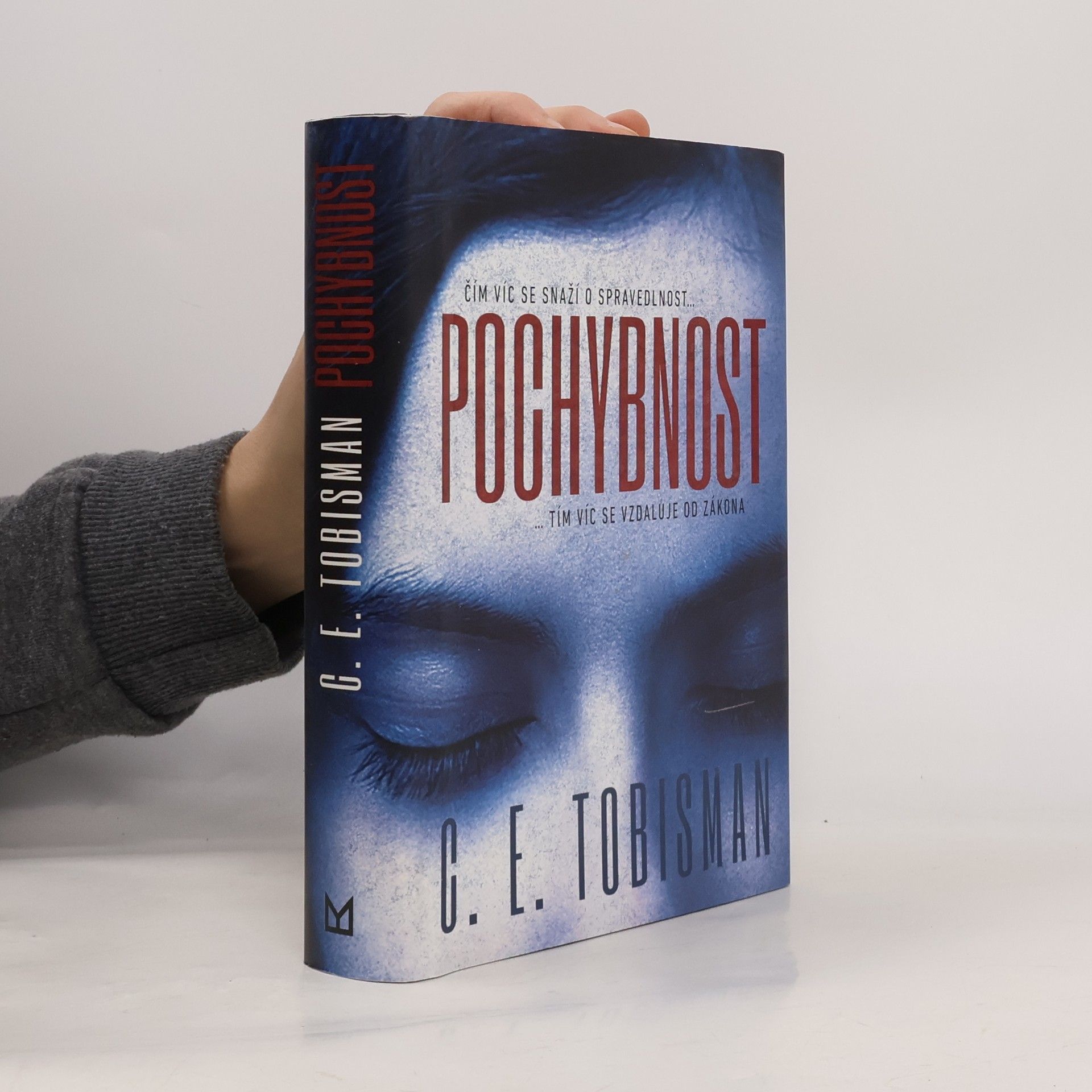 C. E. Tobisman Pochybnost