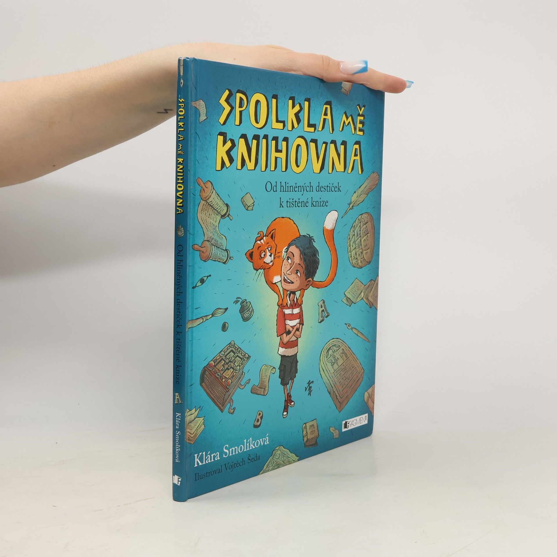 Klára Smolíková Spolkla mě knihovna. Od hliněných destiček k tištěné knize