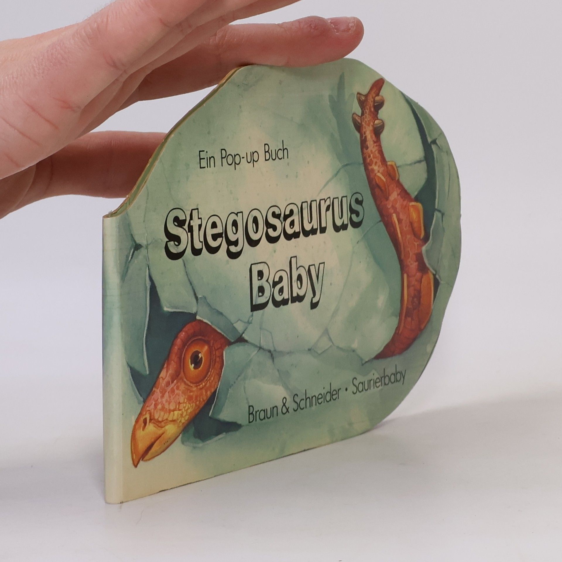 Stegosaurus-Baby. Ein Pop-up-Buch. Saurierbaby