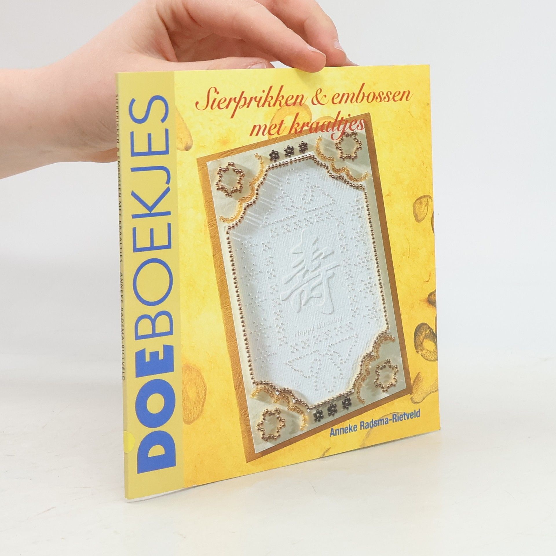 Anneke Radsma-Rietveld Sierprikken en embossen met kraaltjes