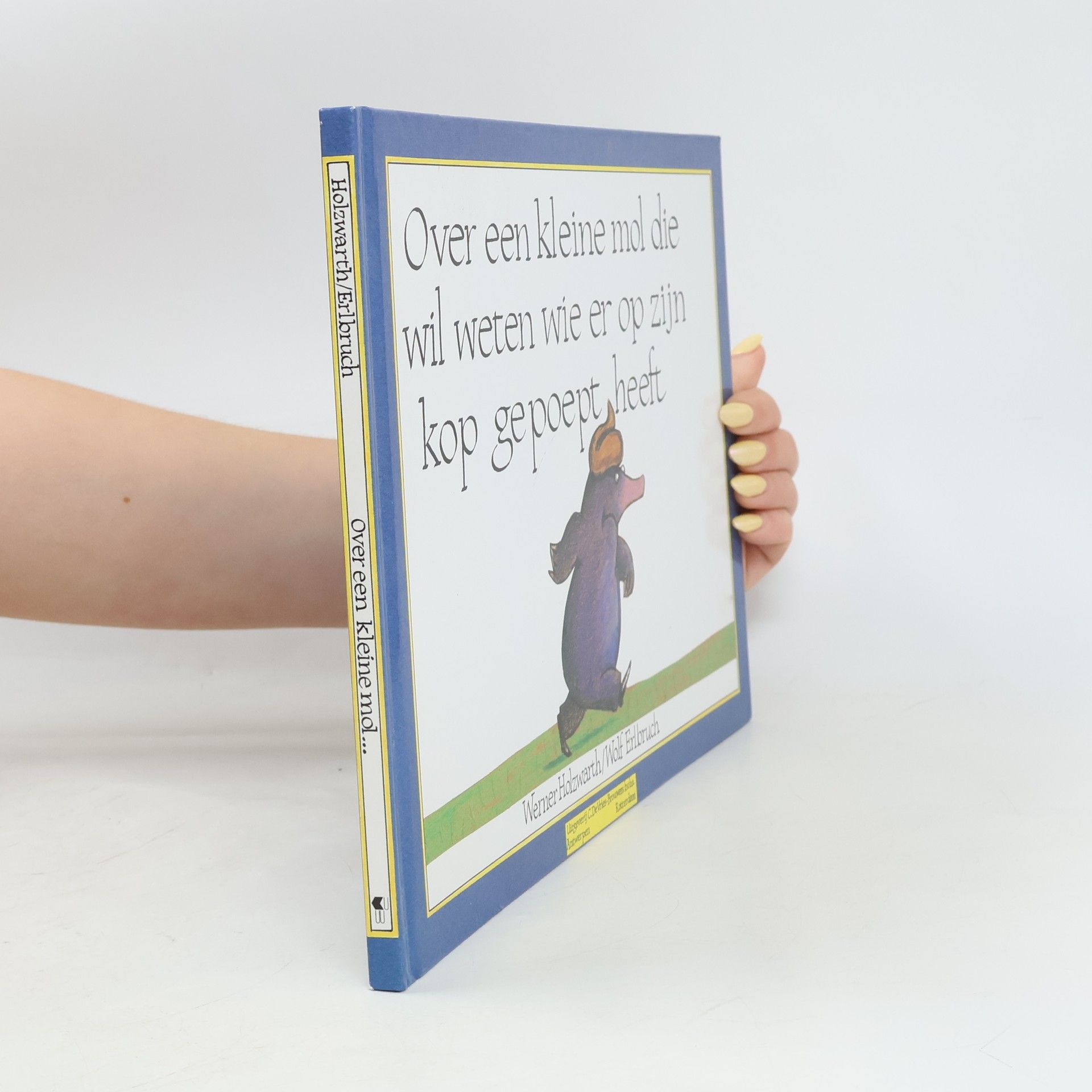 Wolf Erlbruch Over een kleine mol die wil weten wie er op zijn kop gepoept heeft