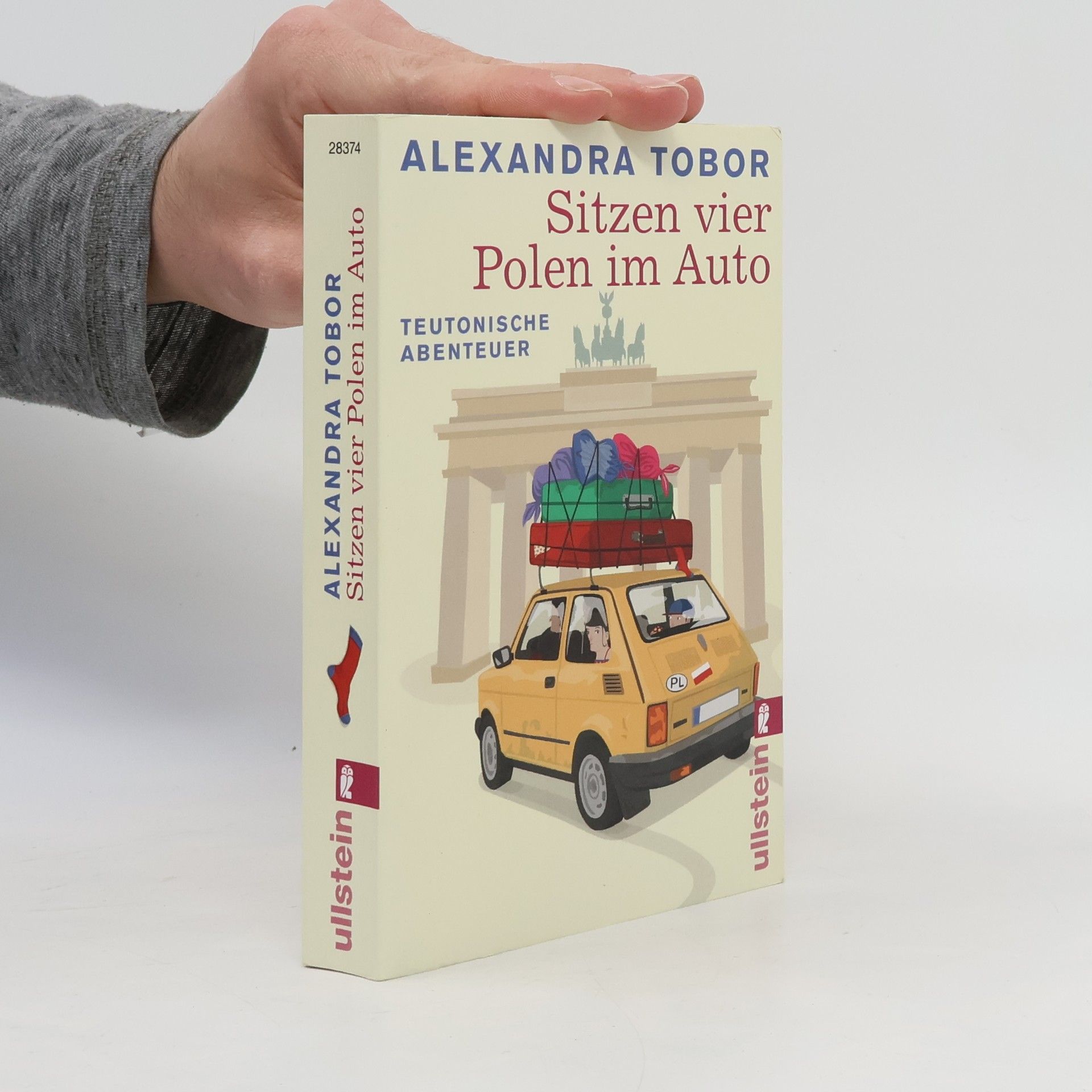 Alexandra Tobor Sitzen vier Polen im Auto