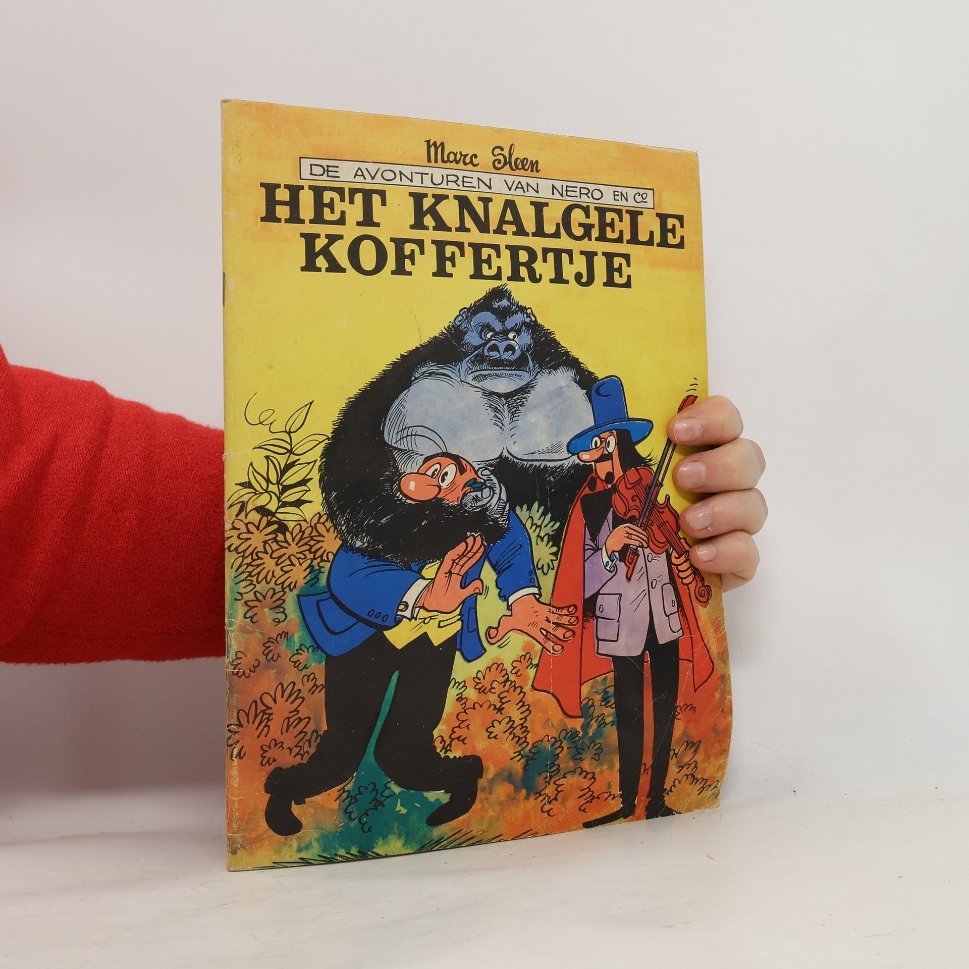 Het knalgele koffertje