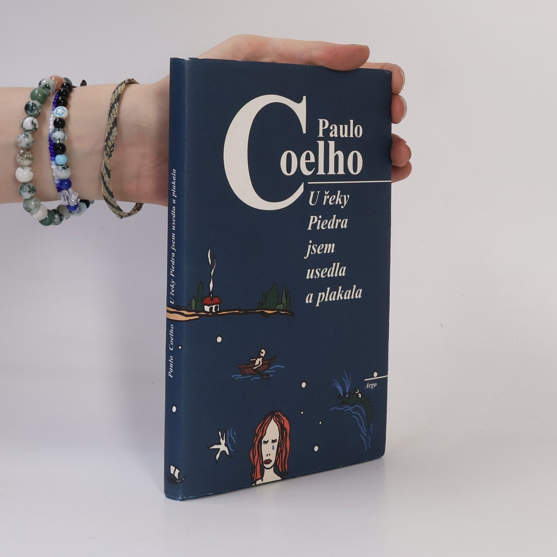 Paulo Coelho U řeky Piedra jsem usedla a plakala