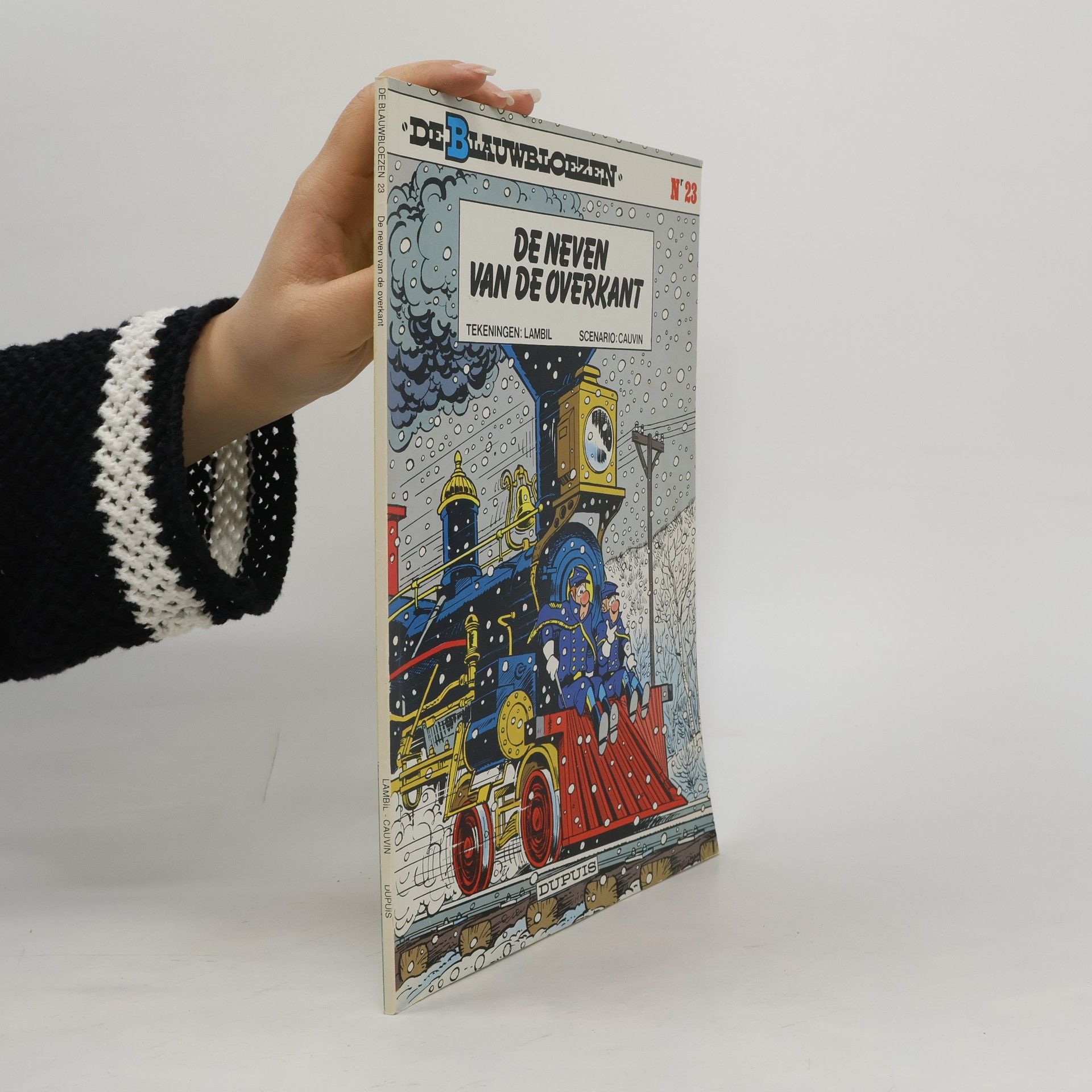 De blauwbloezen - 23: De neven van de overkant