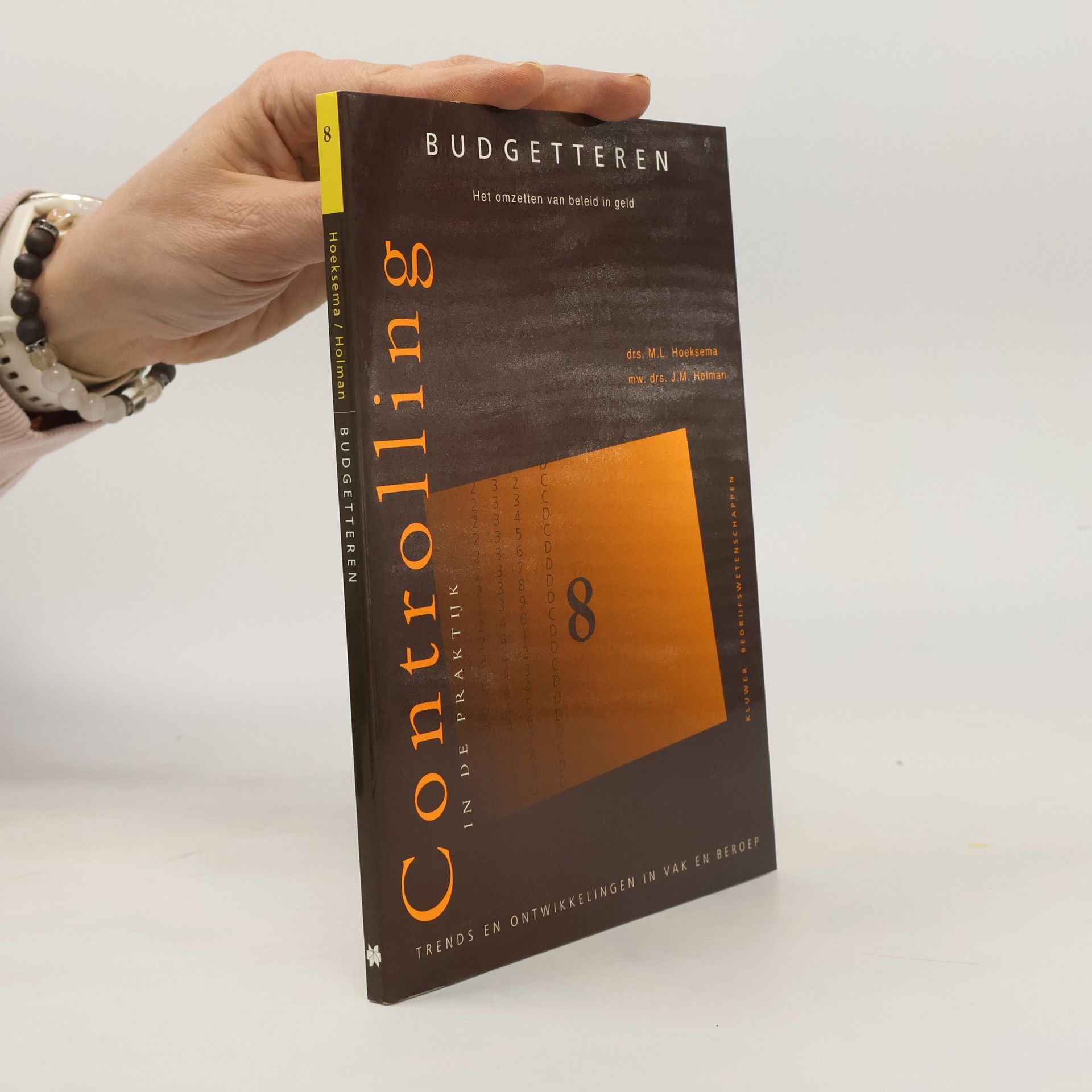J. M. Holman Budgetteren