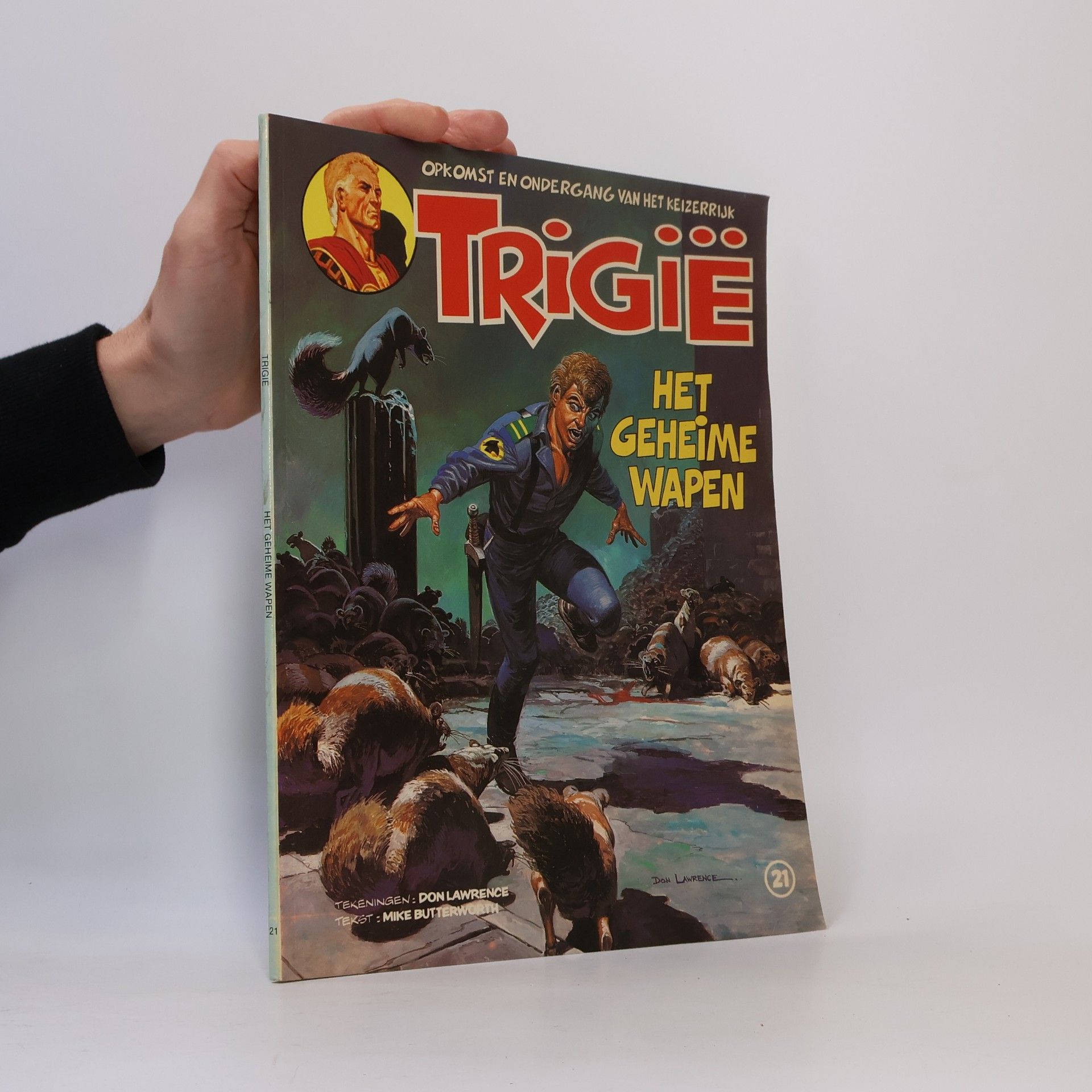 Trigië 21. Het Geheime Wapen