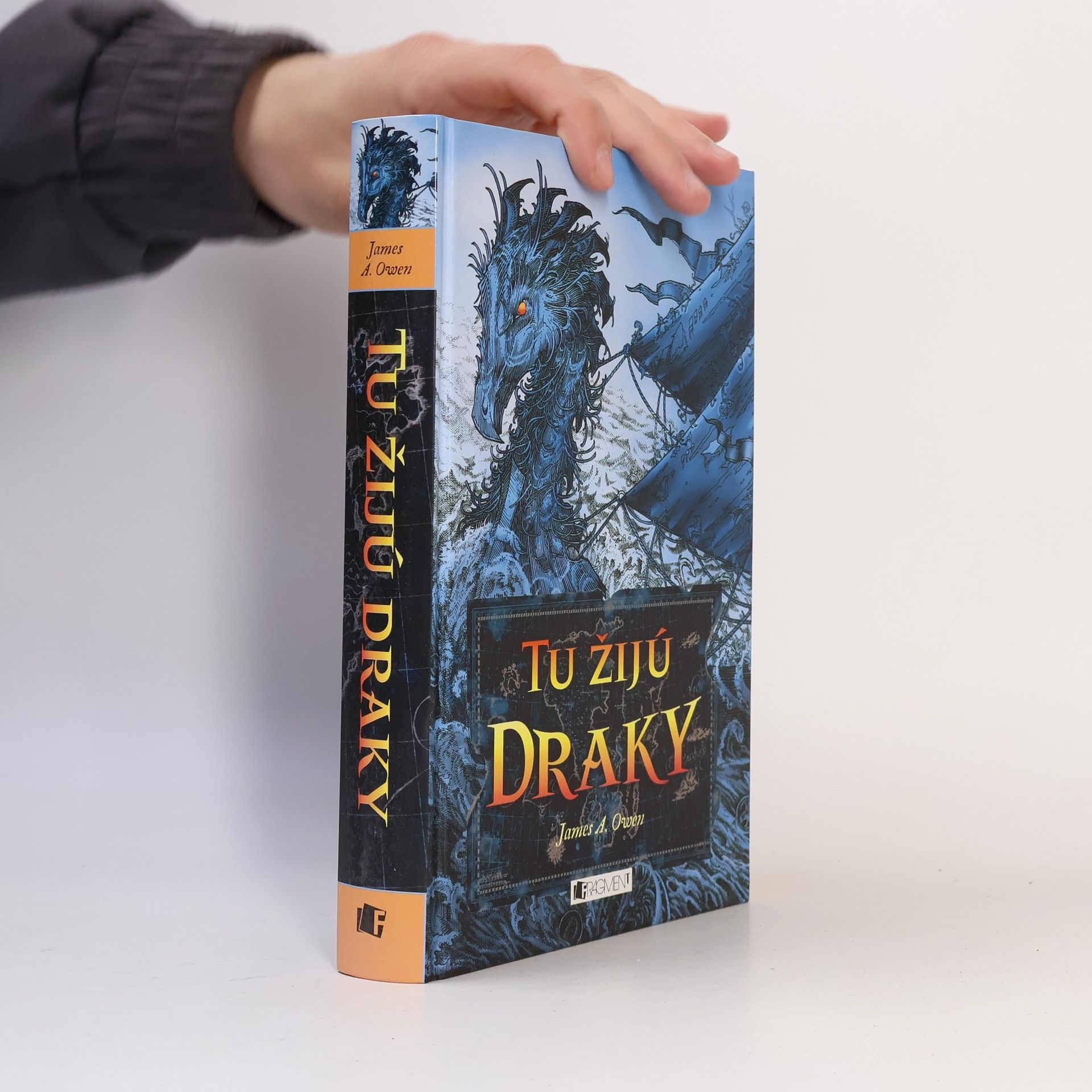 James A. Owen Tu žijú draky