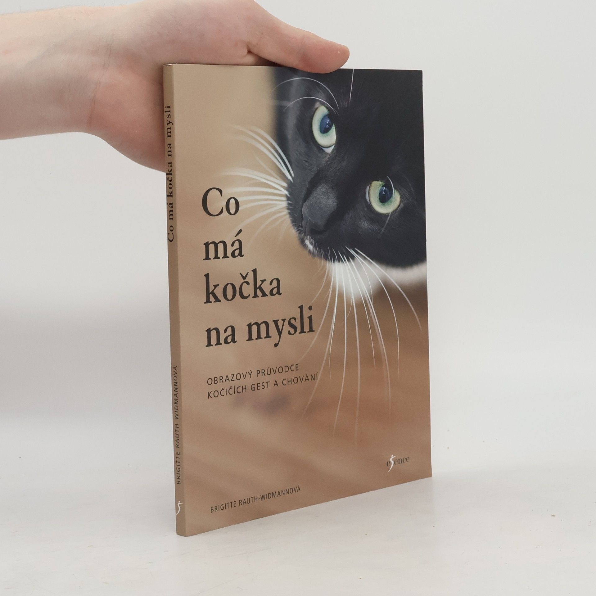 Co má kočka na mysli: Obrazový průvodce kočičích gest a chování