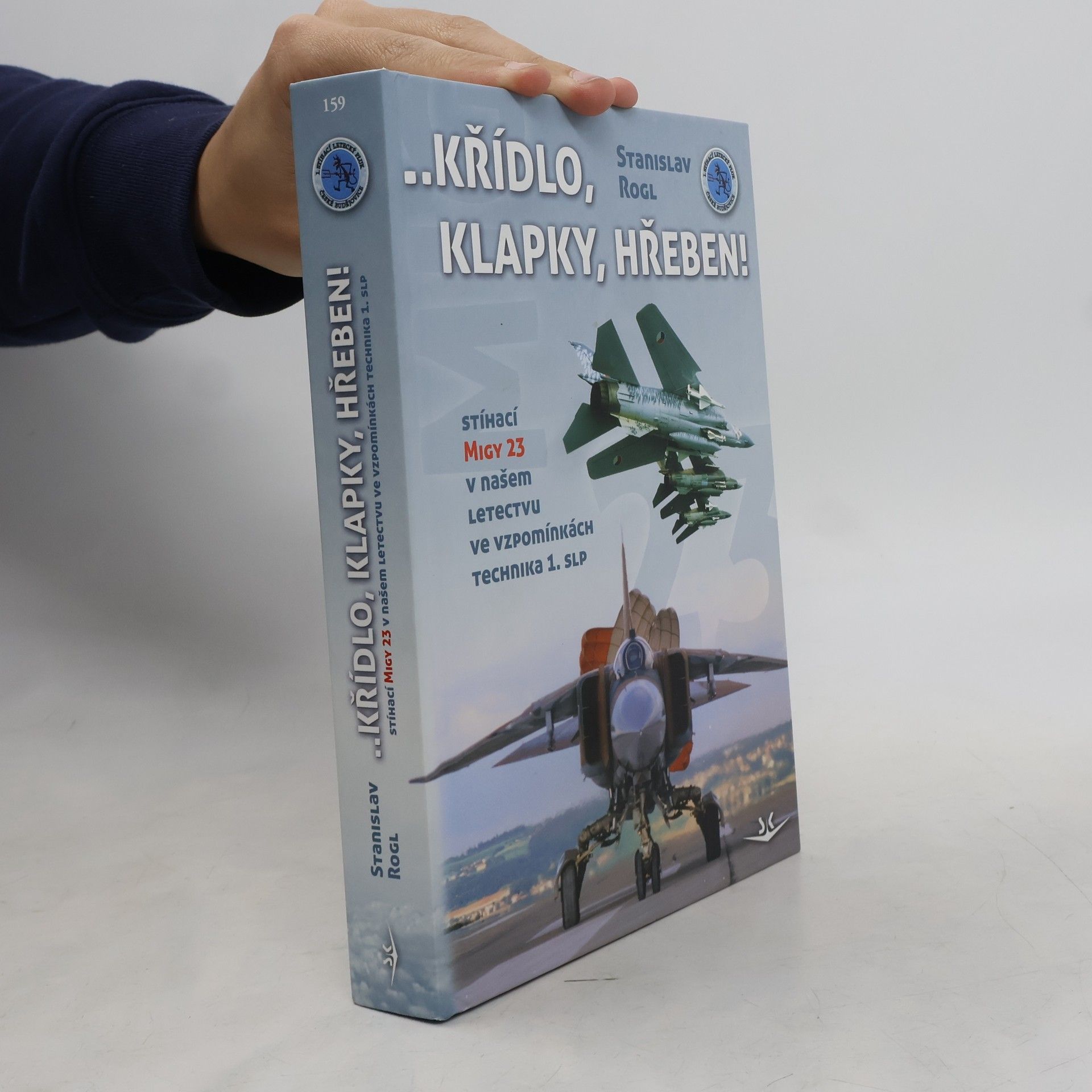 Stanislav Rogl Křídlo, klapky, hřeben! : stíhací MiGy 23 v našem letectvu ve vzpomínkách technika 1. slp