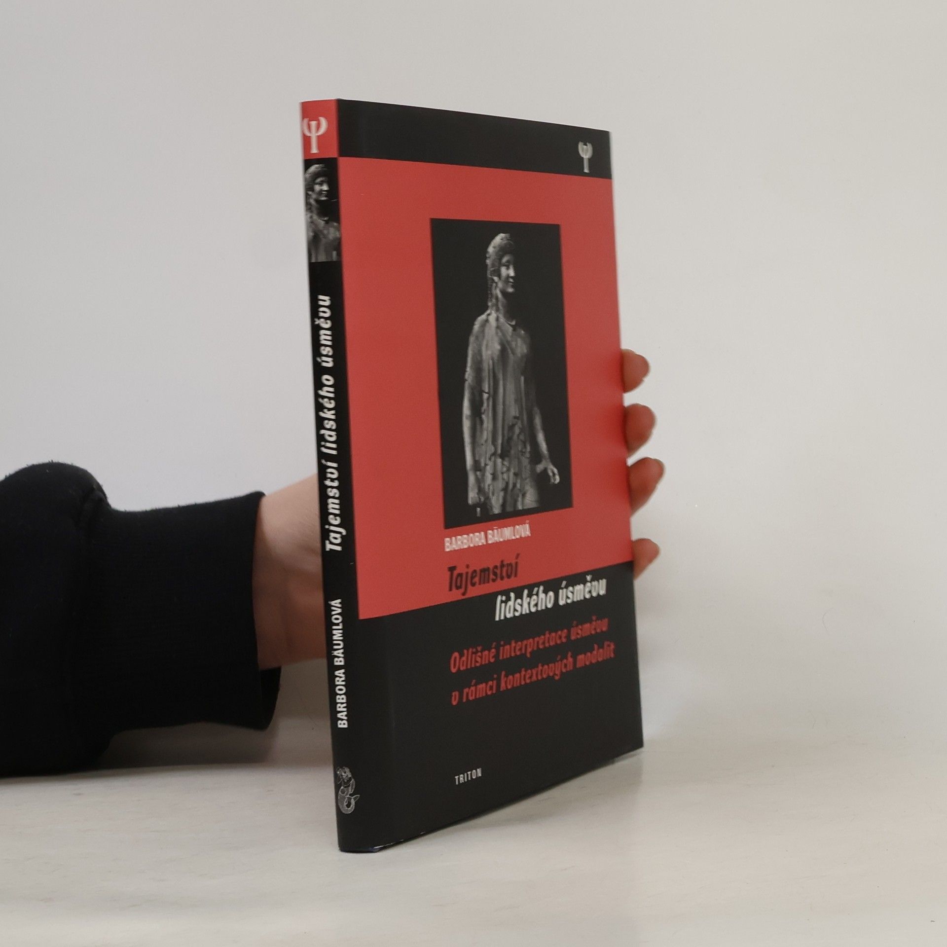 Barbora Bäumlová Tajemství lidského úsměvu : odlišné interpretace úsměvu v rámci kontextových modalit