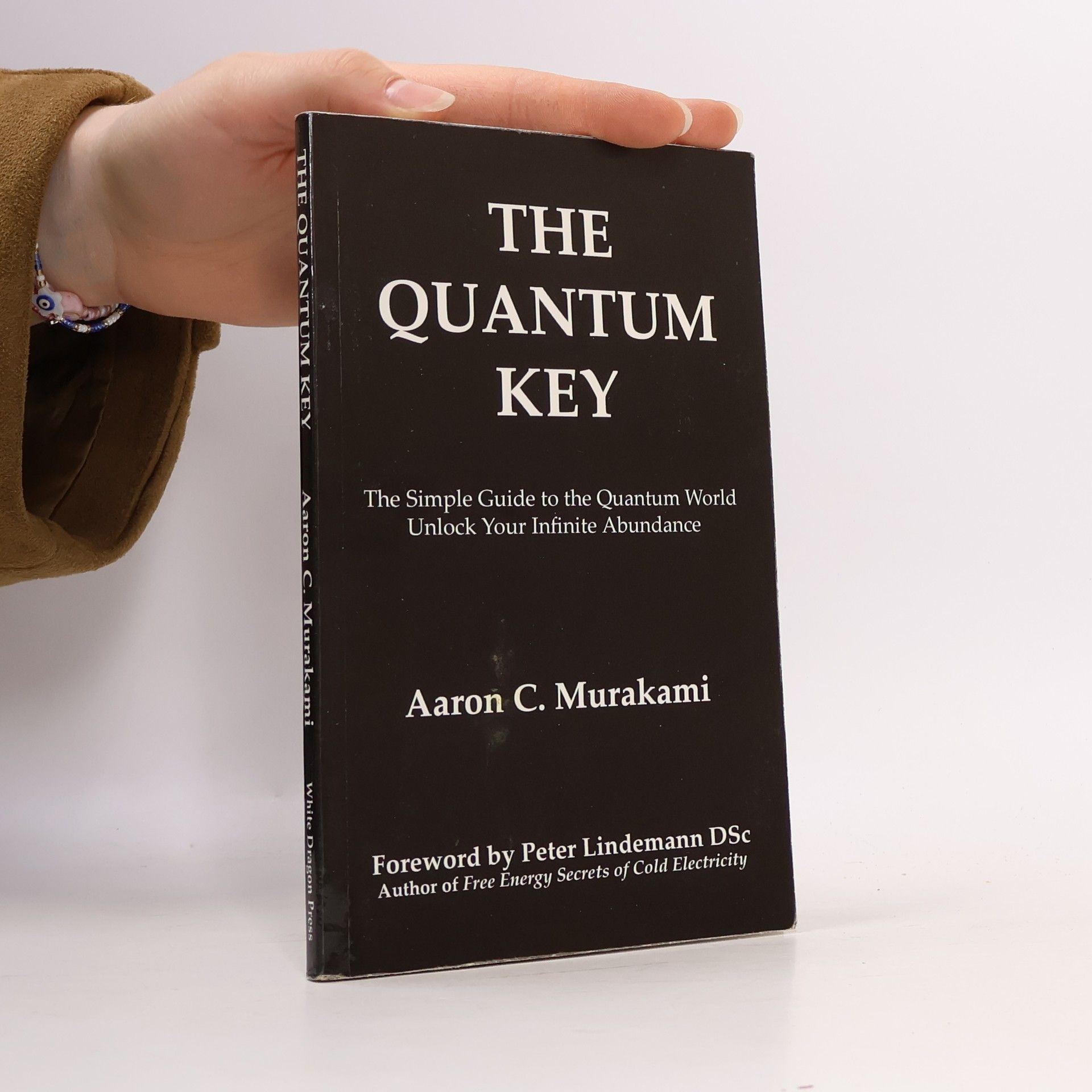 Aaron C. Murakami The Quantum Key