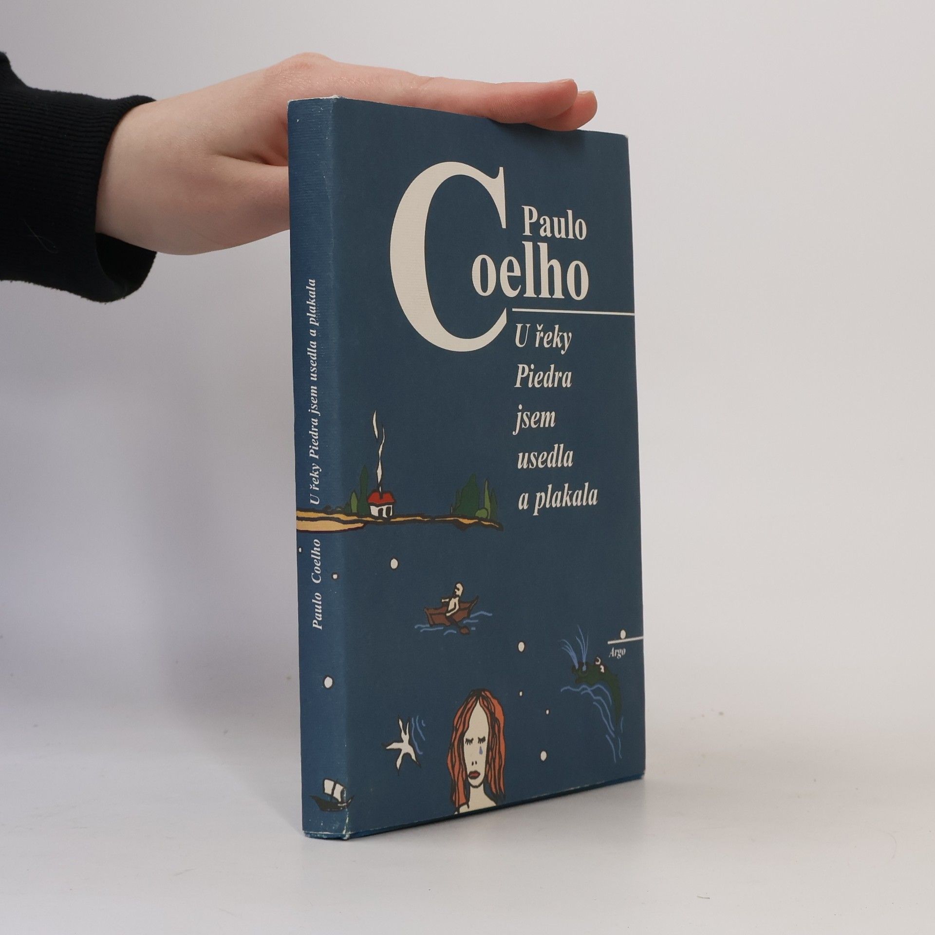 Paulo Coelho U řeky Piedra jsem usedla a plakala