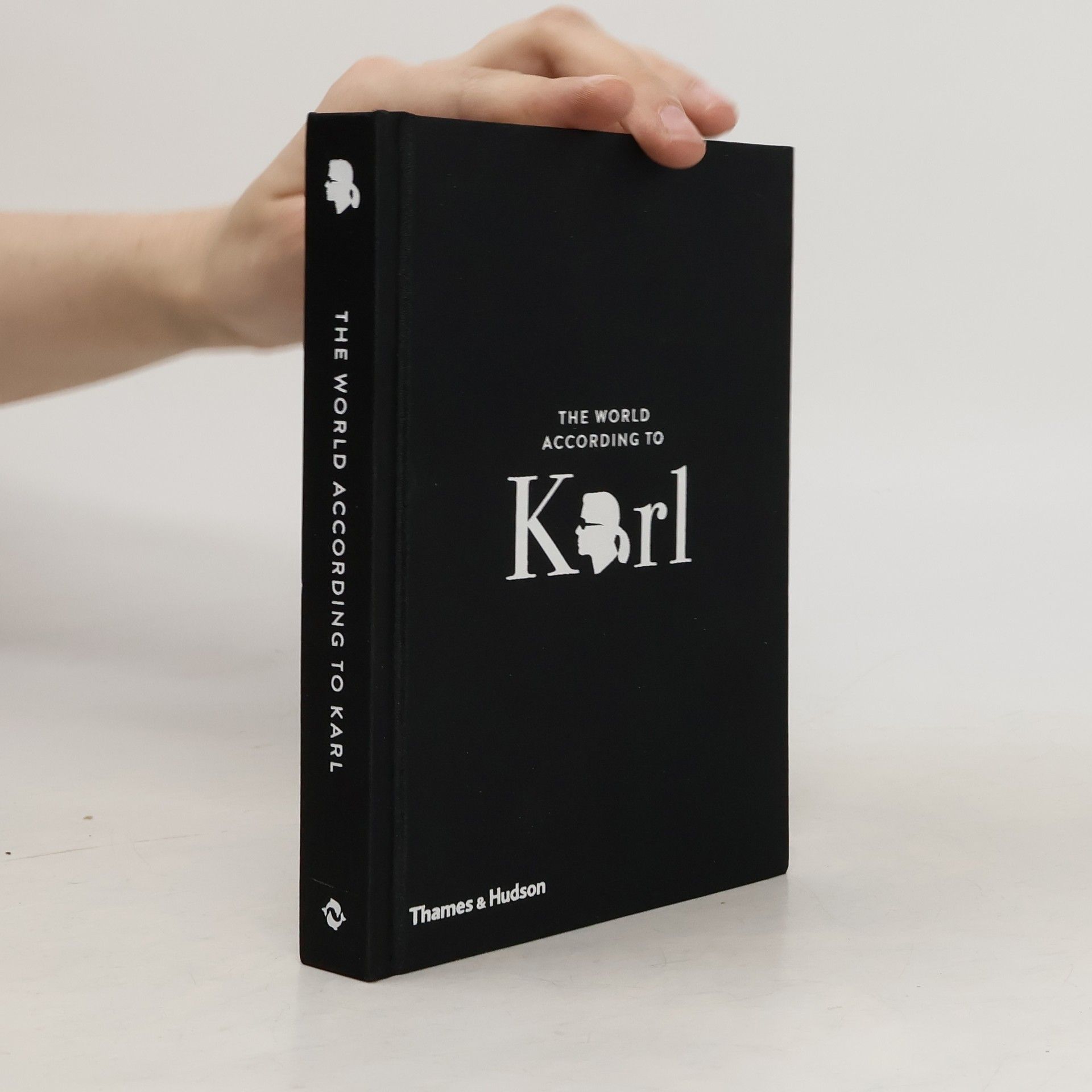 Kolektiv autorů The world according to Karl : the wit and wisdom of Karl Lagerfeld