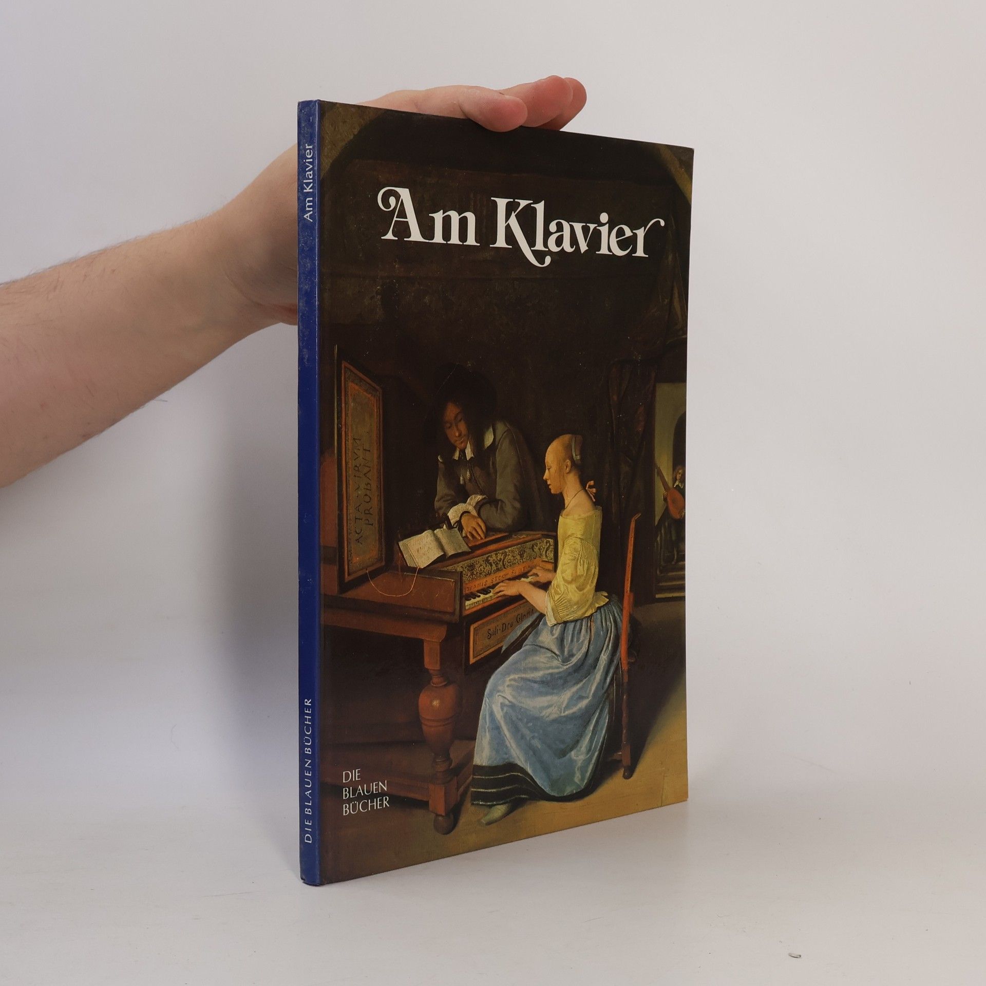 Die Blauen Bücher. Am Klavier
