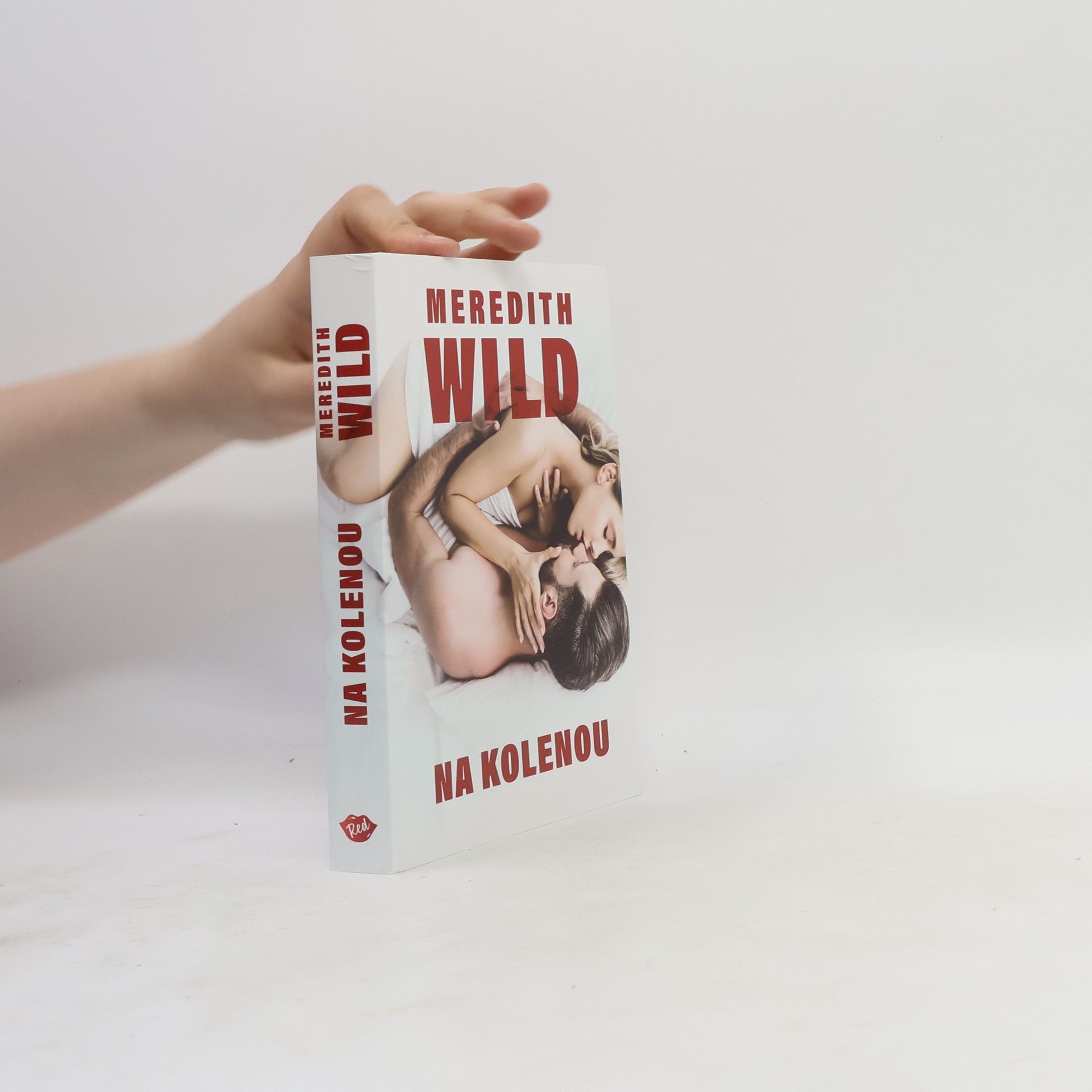 Meredith Wild Na kolenou