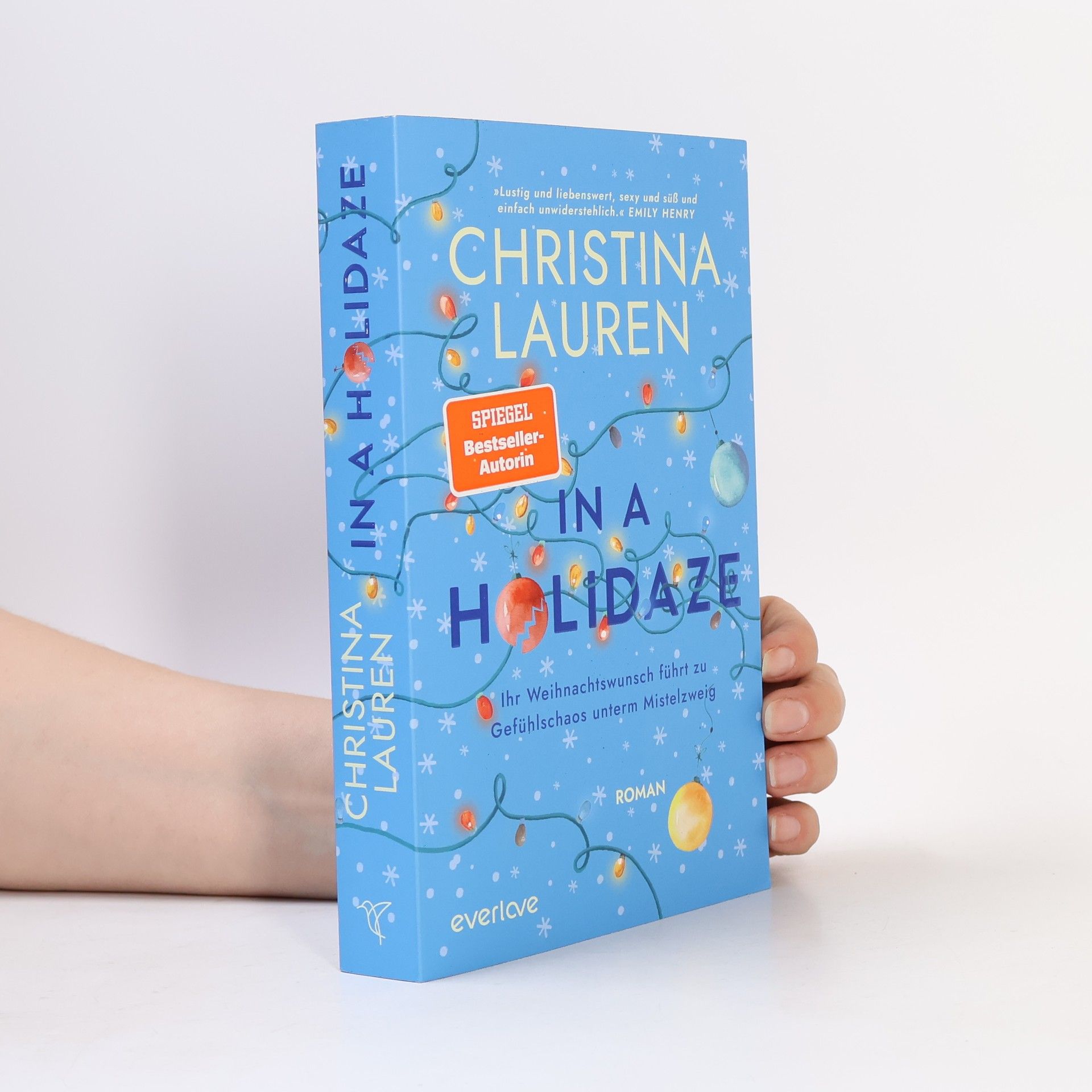 Christina Lauren In a Holidaze - Ihr Weihnachtswunsch führt zu Gefühlschaos unterm Mistelzweig