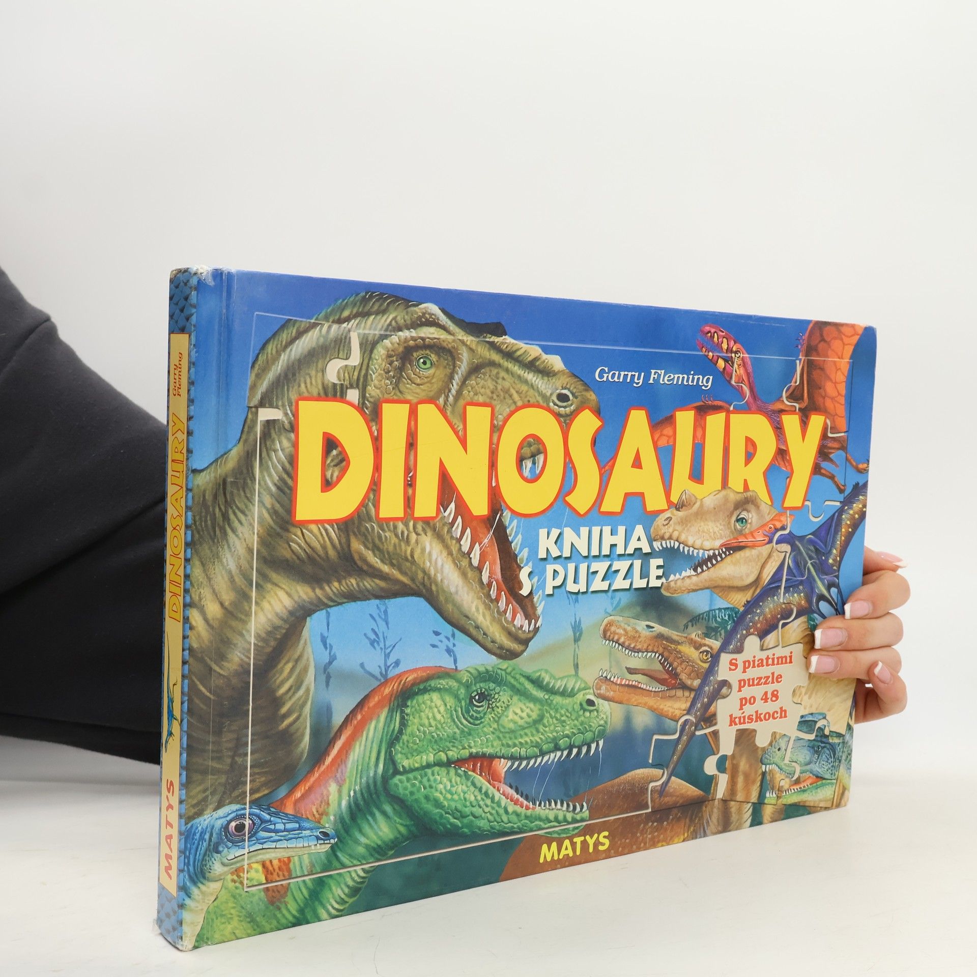 Garry Fleming Dinosaury - kniha s puzzle