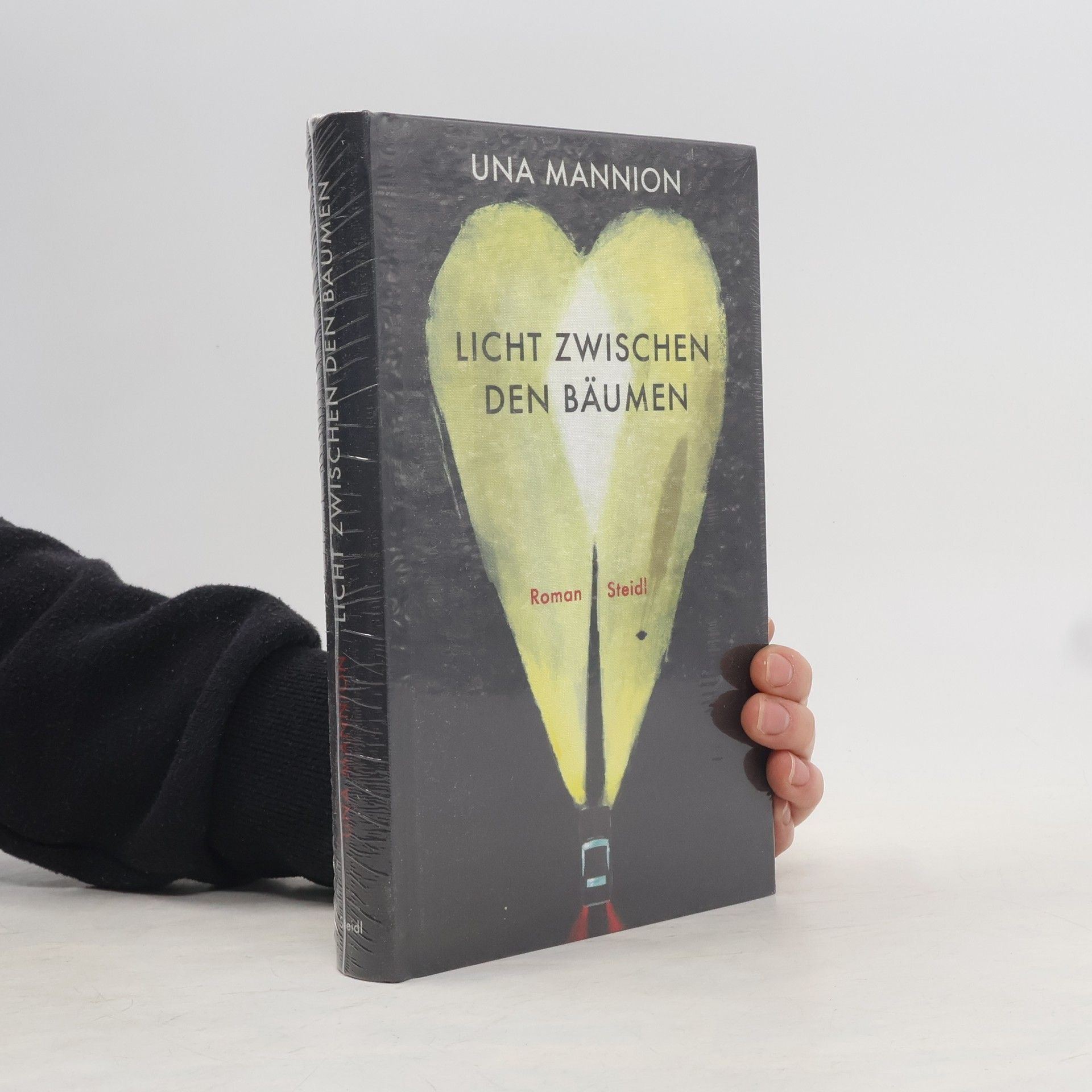 Una Mannion Licht zwischen den Bäumen
