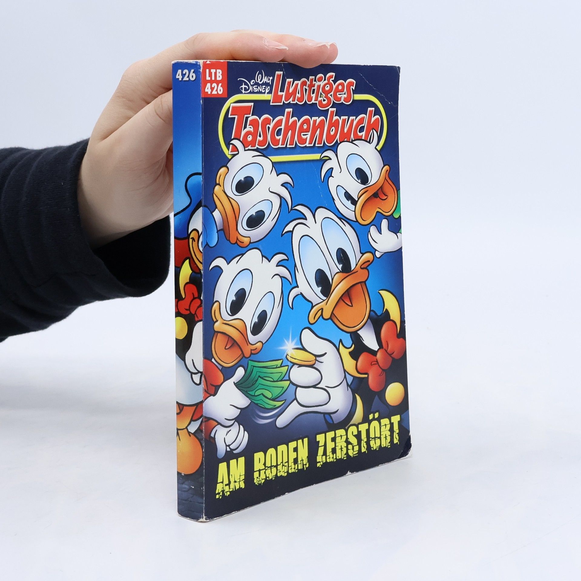 Walt Disney Lustiges Taschenbuch 426. Am Boden Zebstöbt