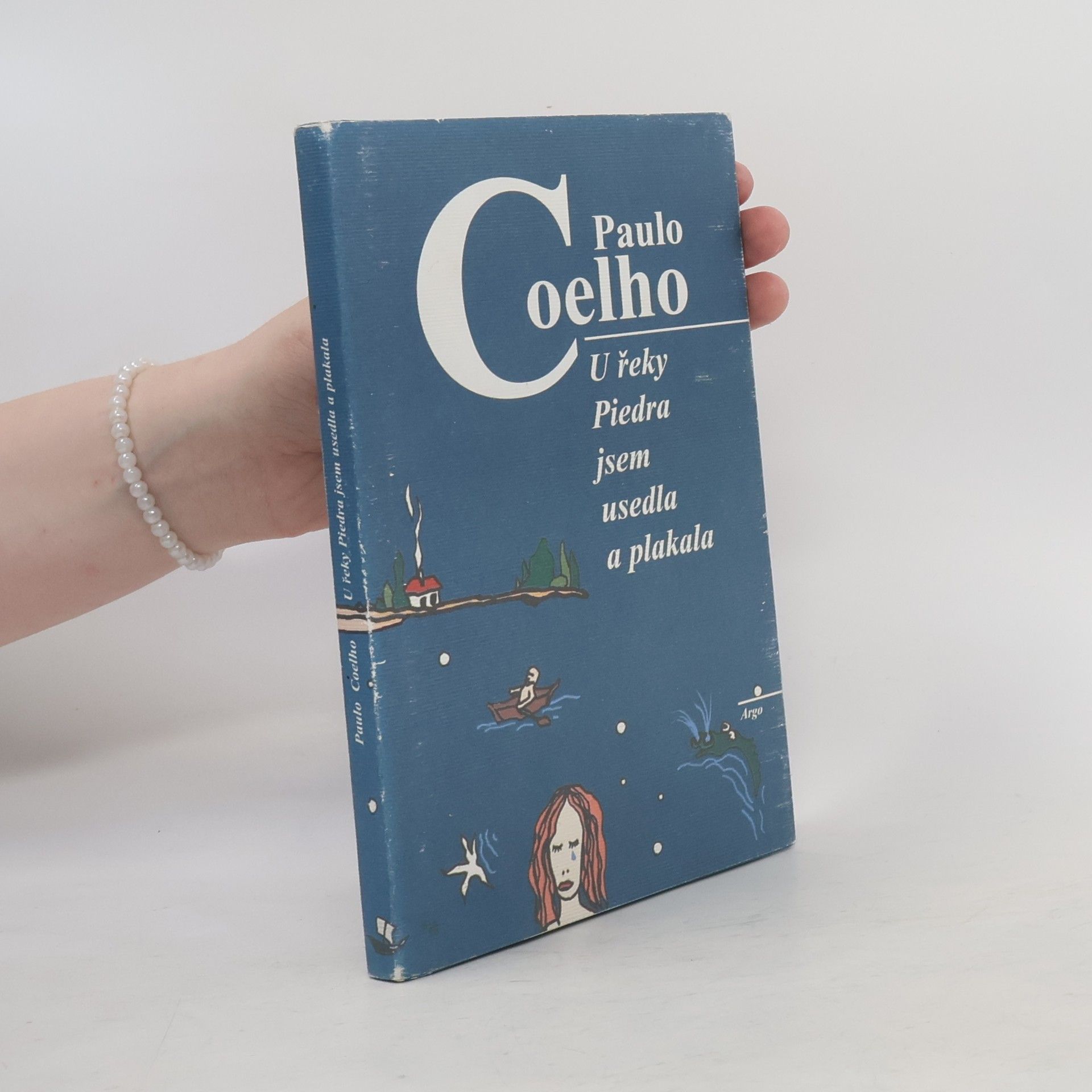 Paulo Coelho U řeky Piedra jsem usedla a plakala