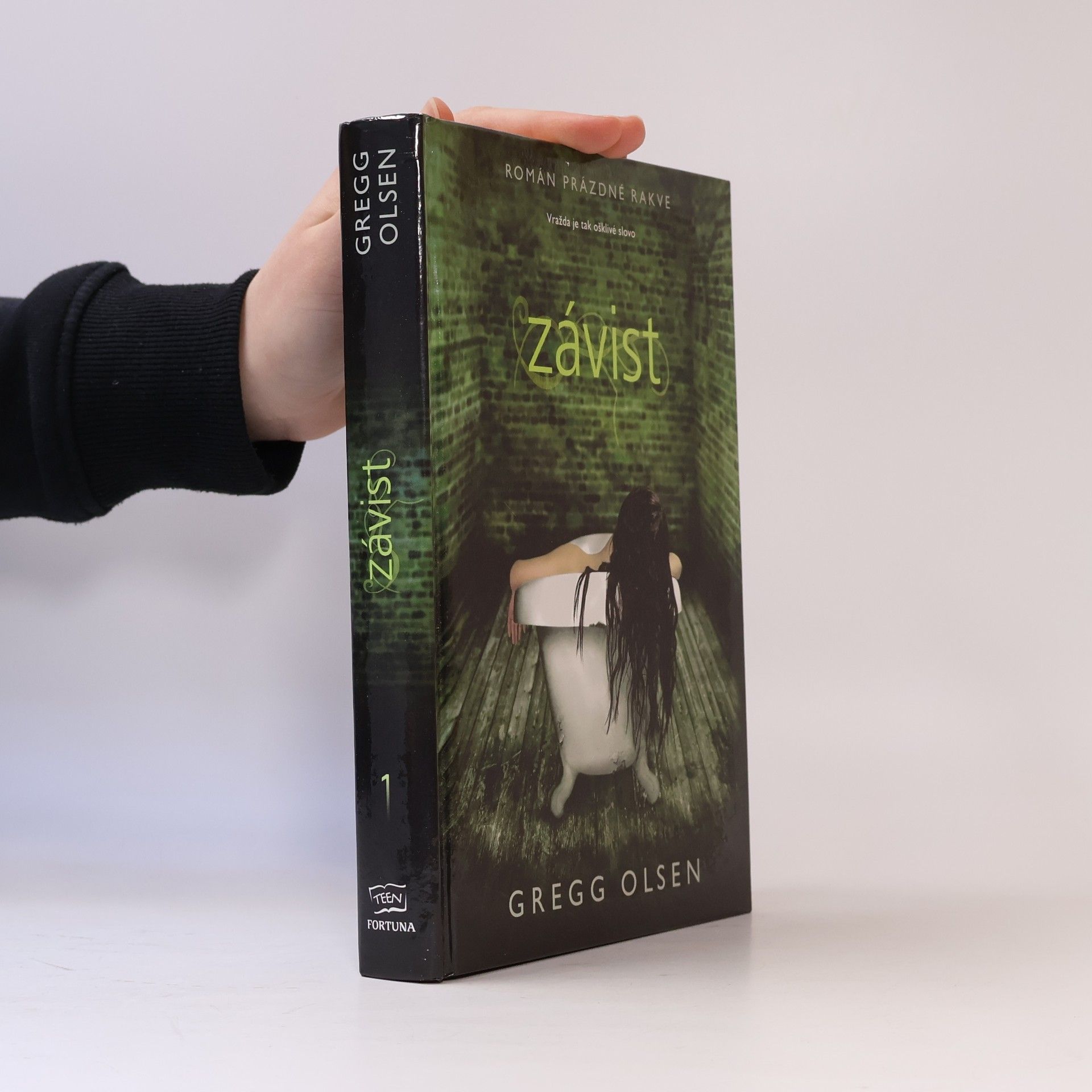 Gregg Olsen Román prázdné rakve: Závist
