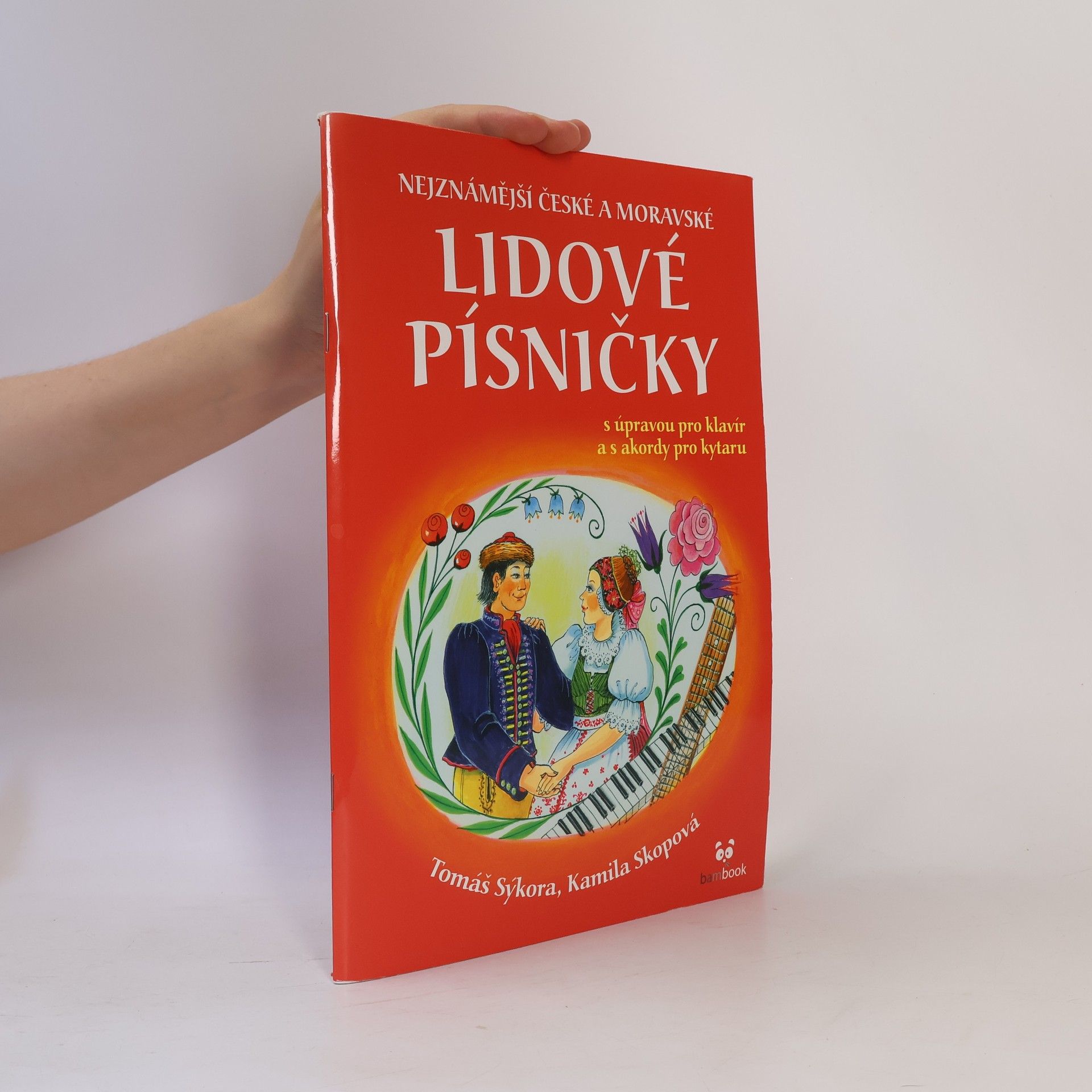 Kamila Skopová Nejznámější české a moravské lidové písničky : s úpravou pro klavír a s akordy pro kytaru