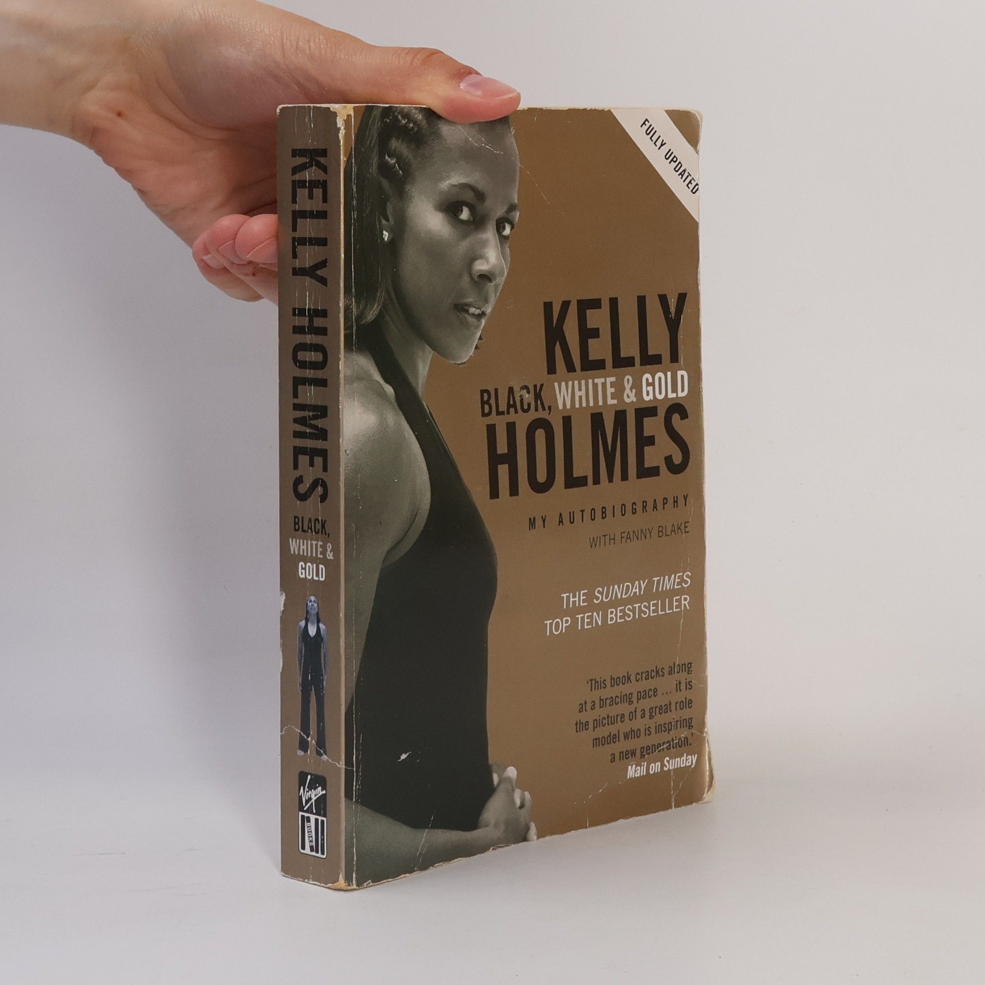 Kelly Holmes Black, White and Gold