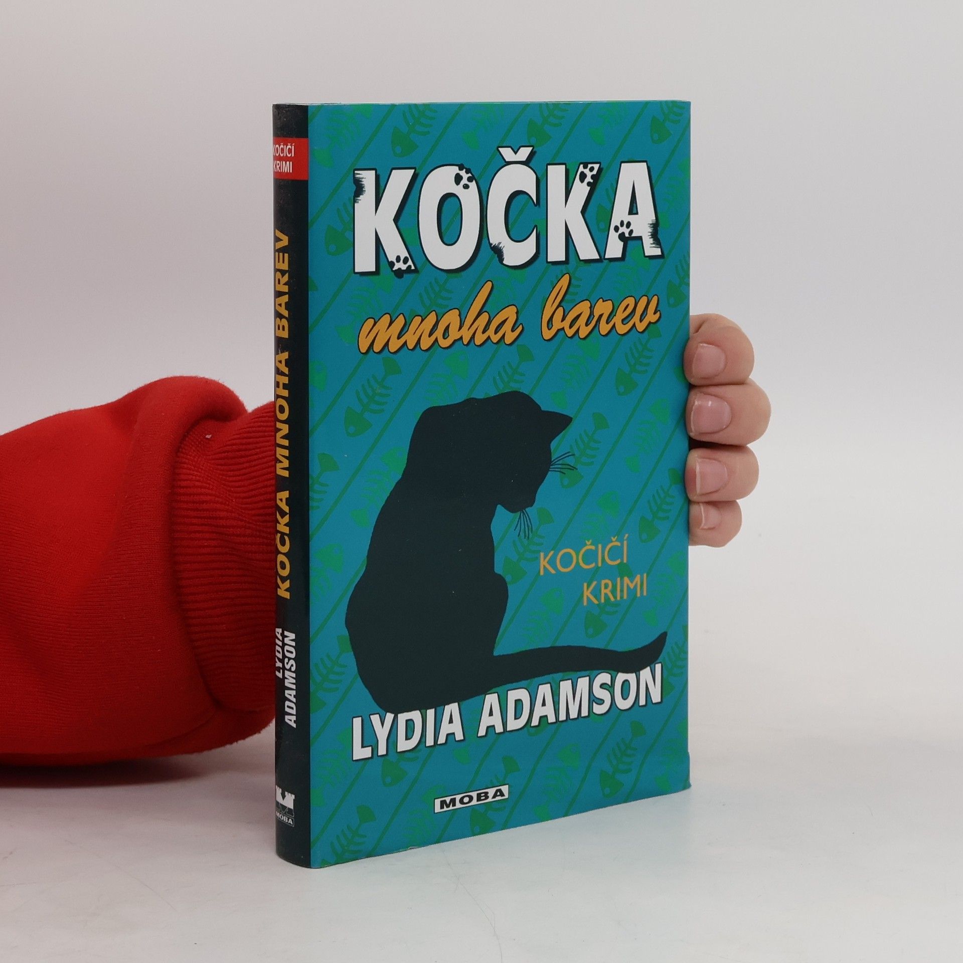 Lydia Adamson Kočka mnoha barev