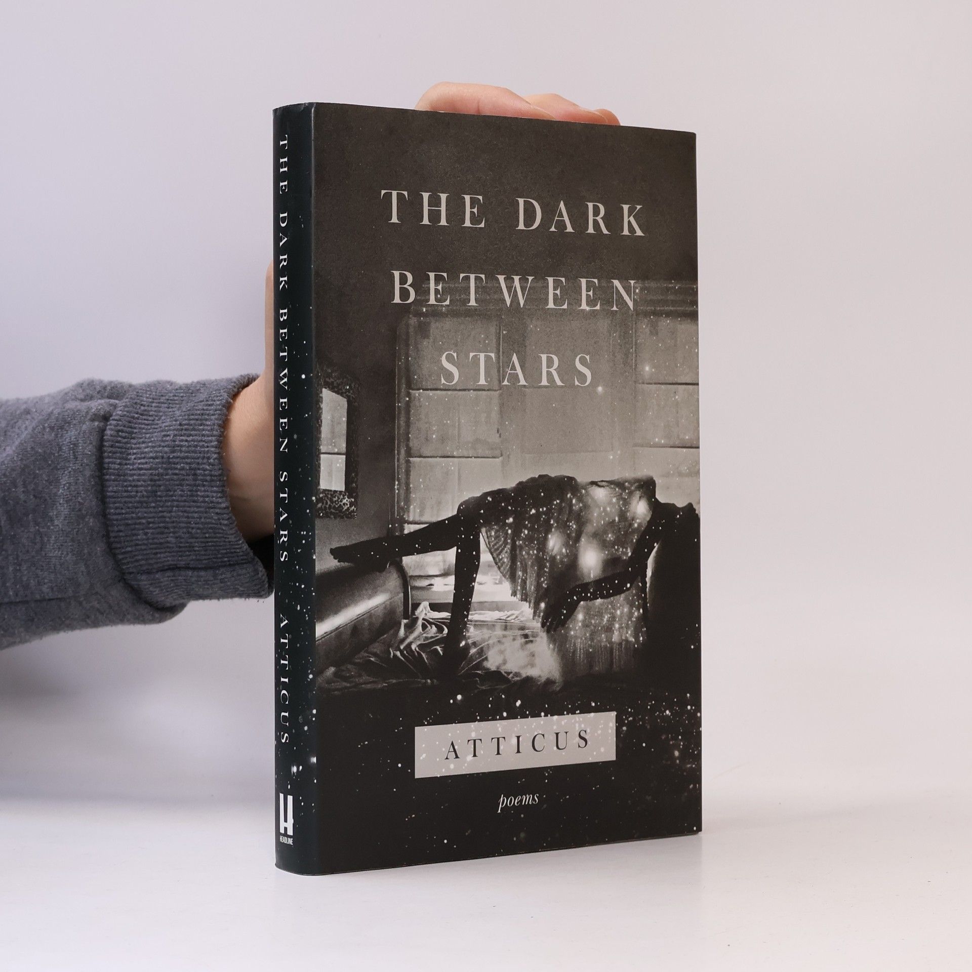 Atticus The dark between stars: Poems