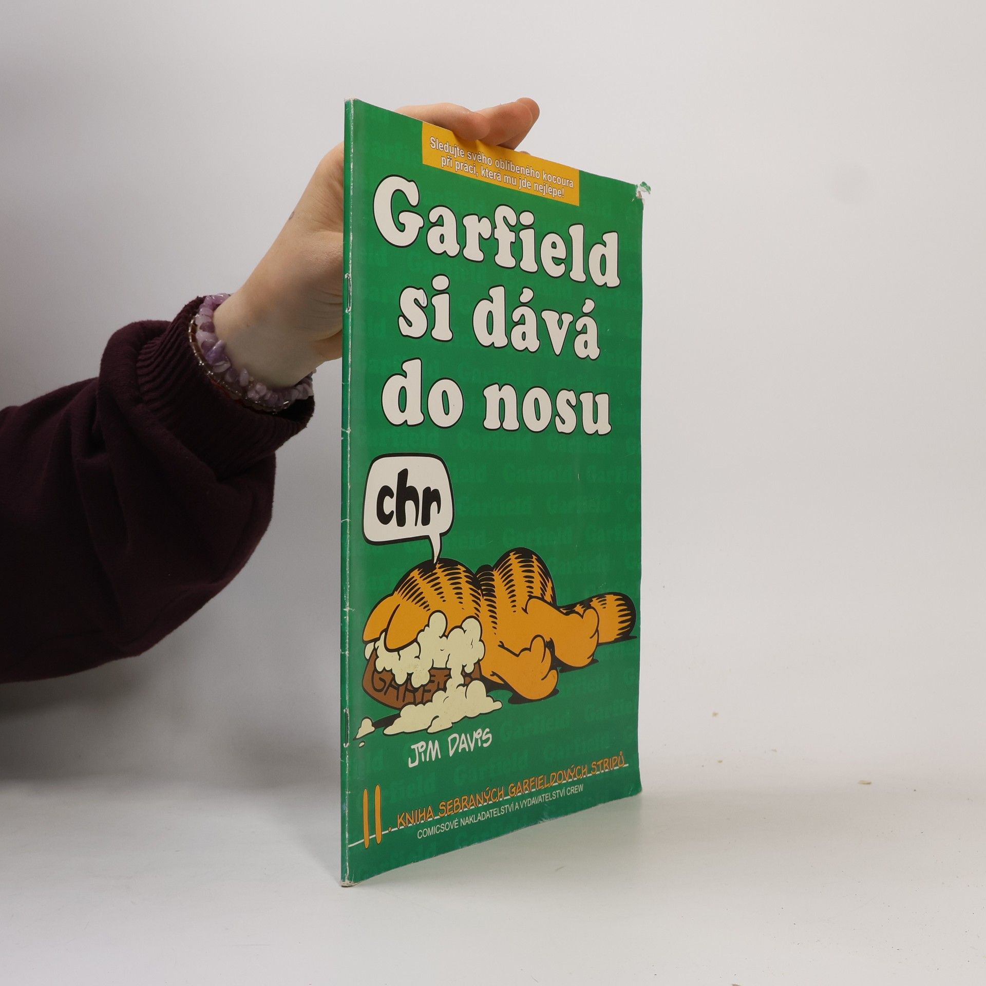Jim Davis Garfield si dává do nosu