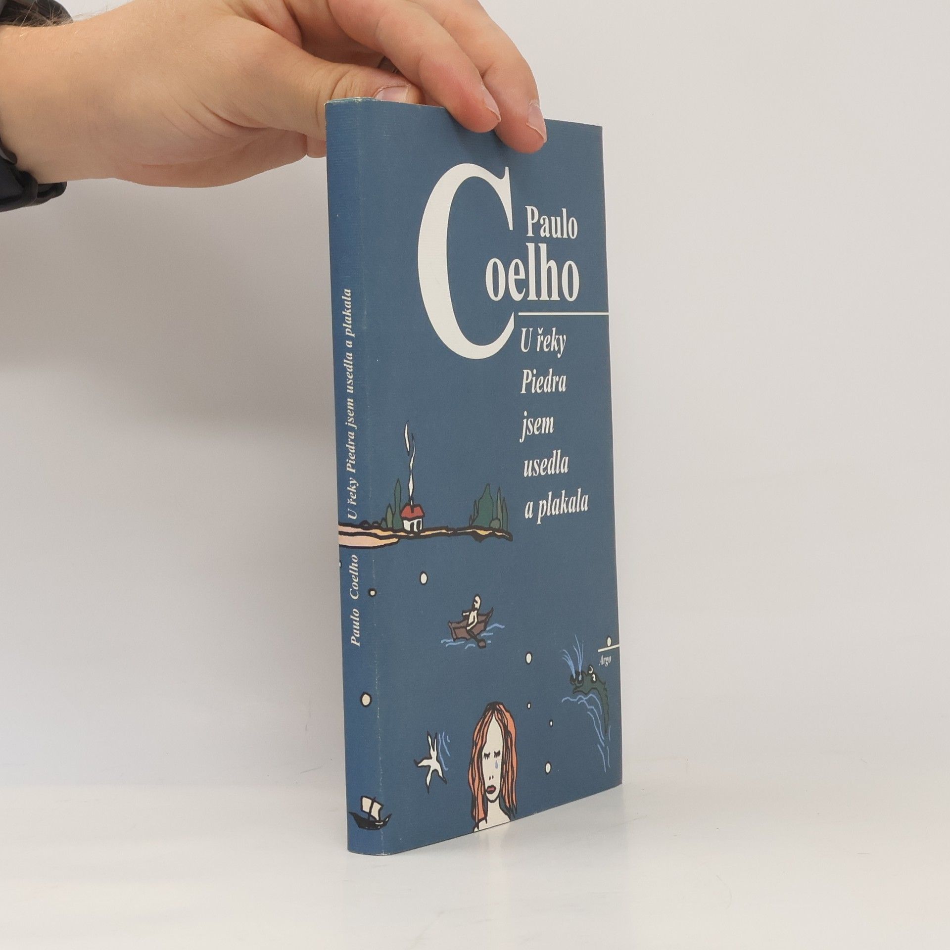 Paulo Coelho U řeky Piedra jsem usedla a plakala
