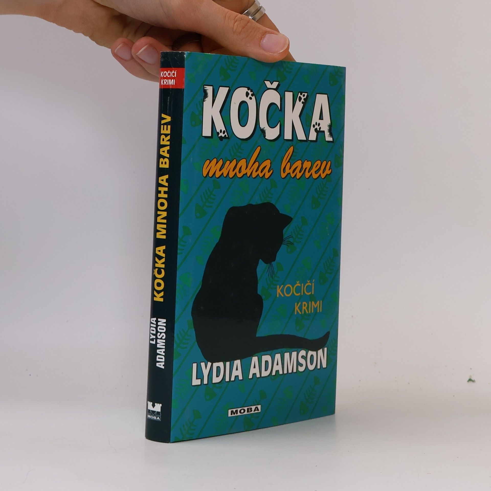 Lydia Adamson Kočka mnoha barev