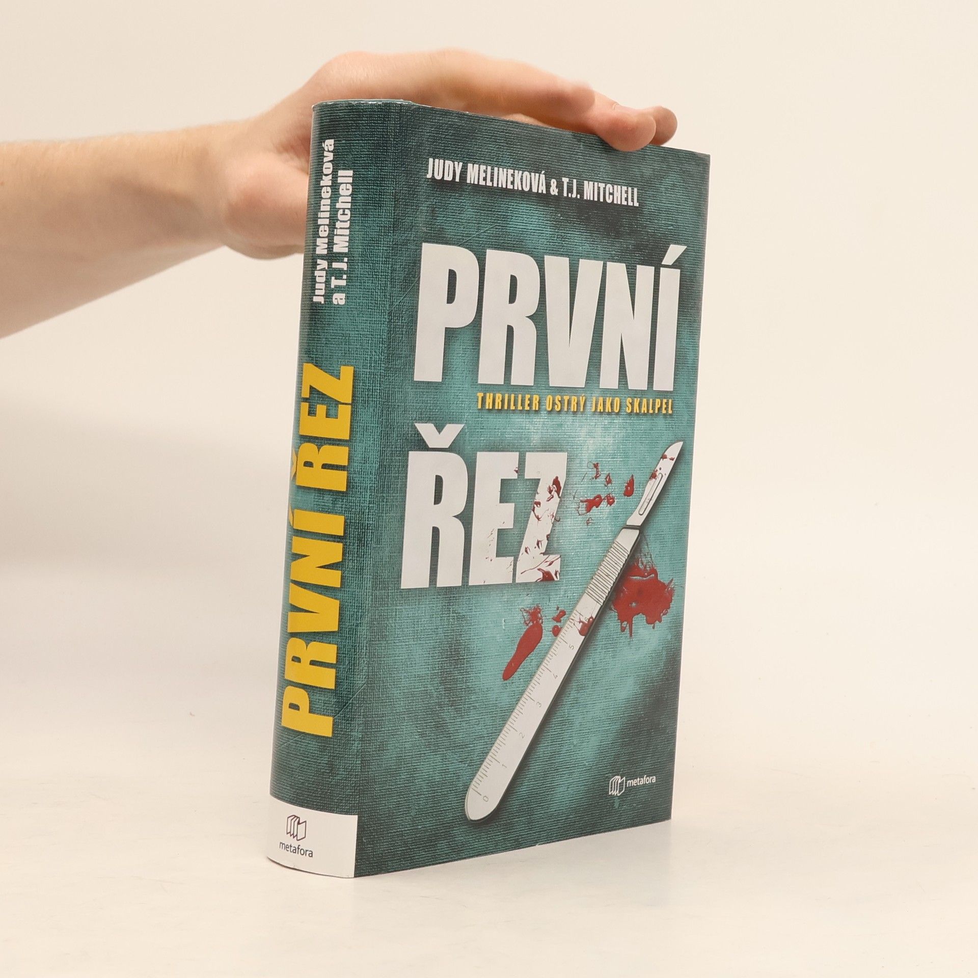 T. J. Mitchell První řez