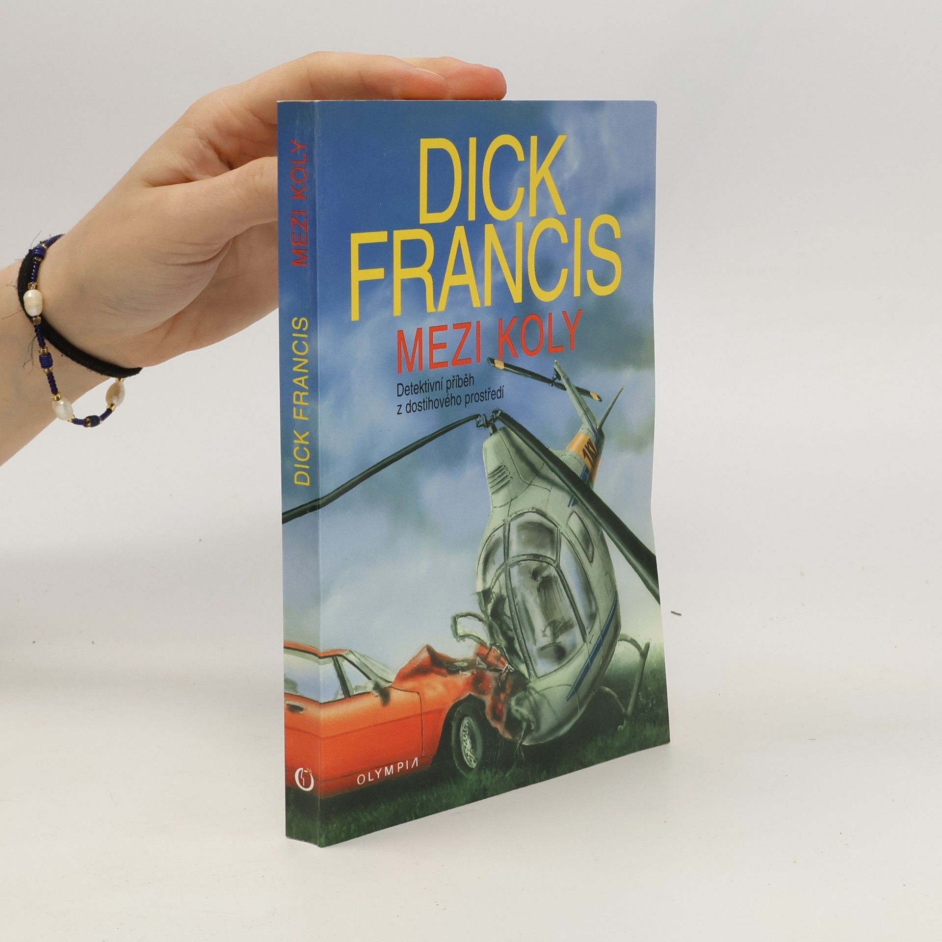 Dick Francis Mezi koly : detektivní příběh z dostihového prostředí
