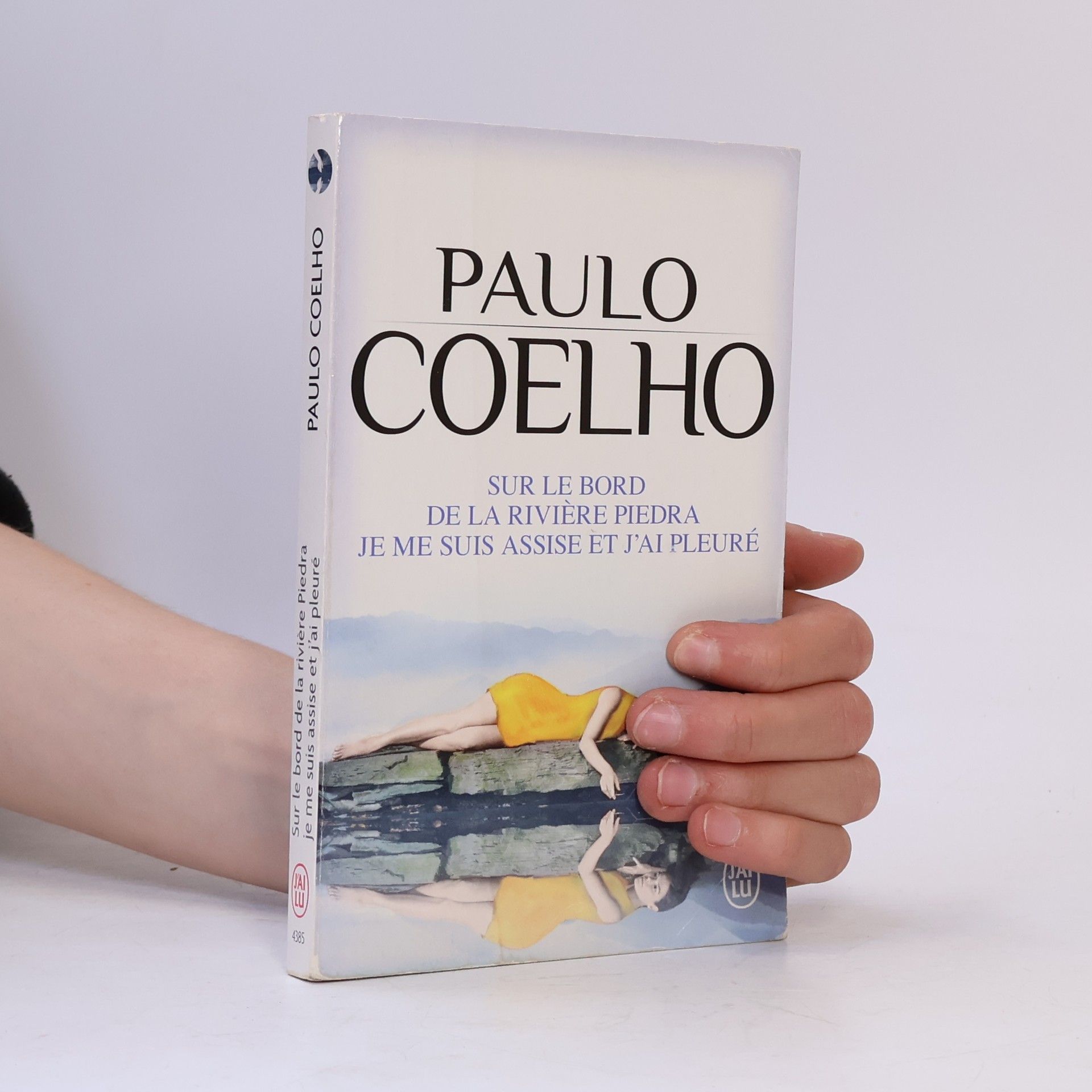 Paulo Coelho Sur le bord de la rivière Piedra, je me suis assise et j'ai pleuré