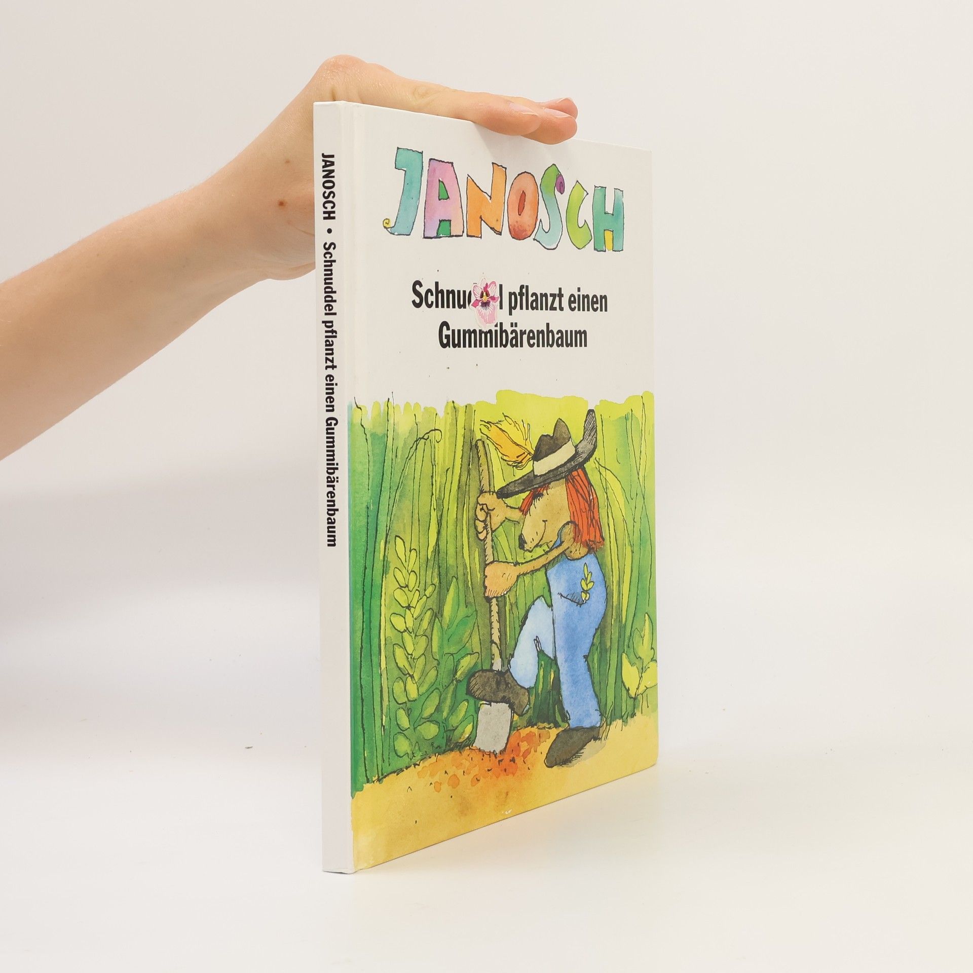 Janosch Schnuddel pflanzt einen Gummibärenbaum