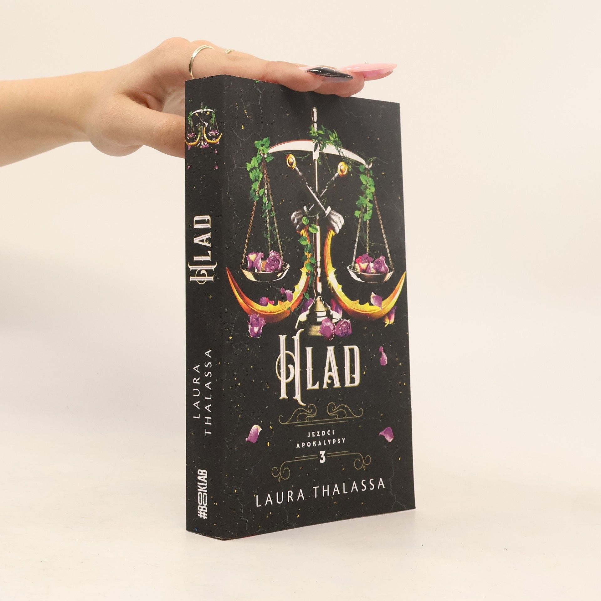 Laura Thalassa Hlad