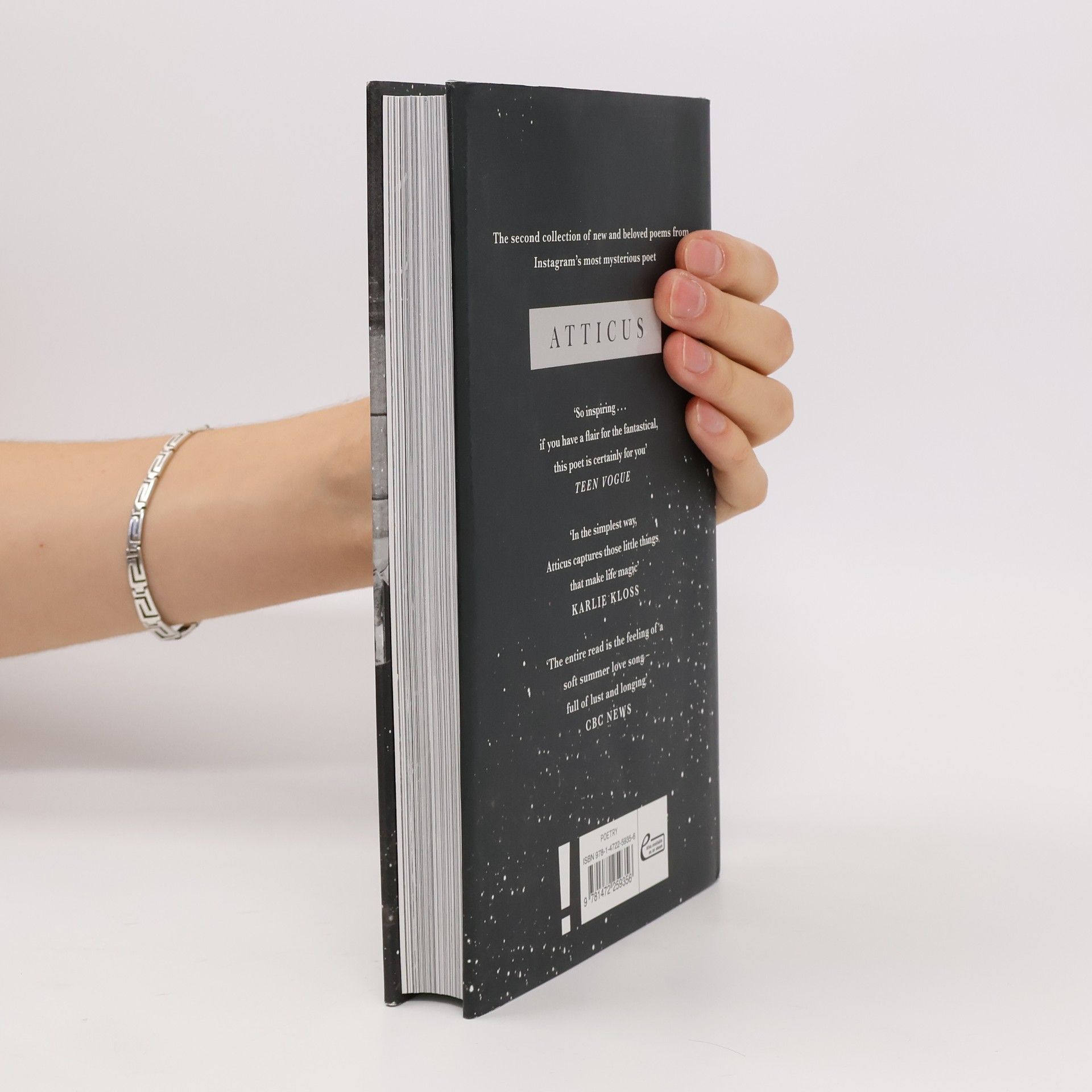 Atticus The dark between stars: Poems
